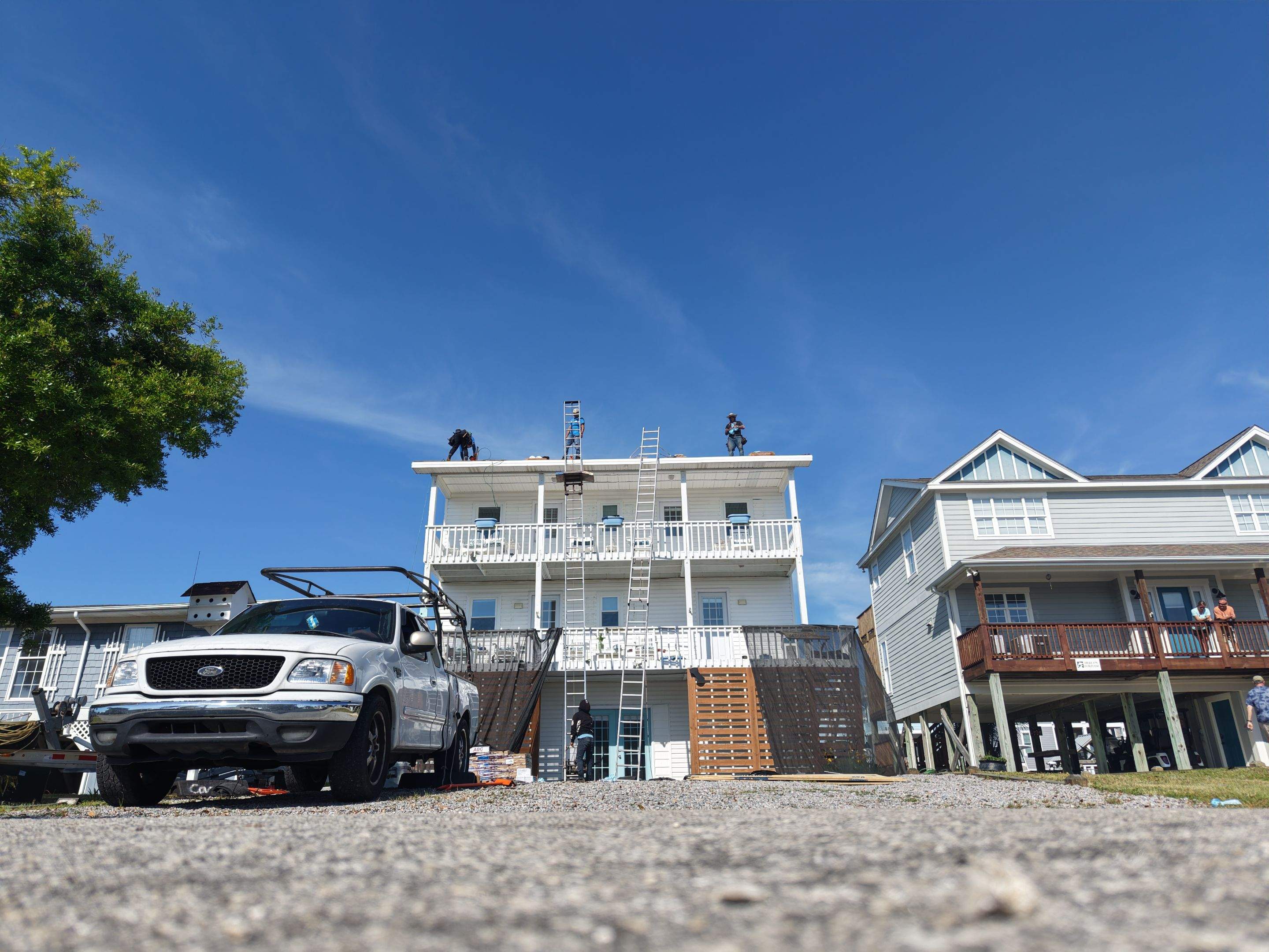 Holden Beach Canal-Side FORTIFIED Roof Replacement with Coastal Blue Shingles by RGR Construction and Roofing, LLC