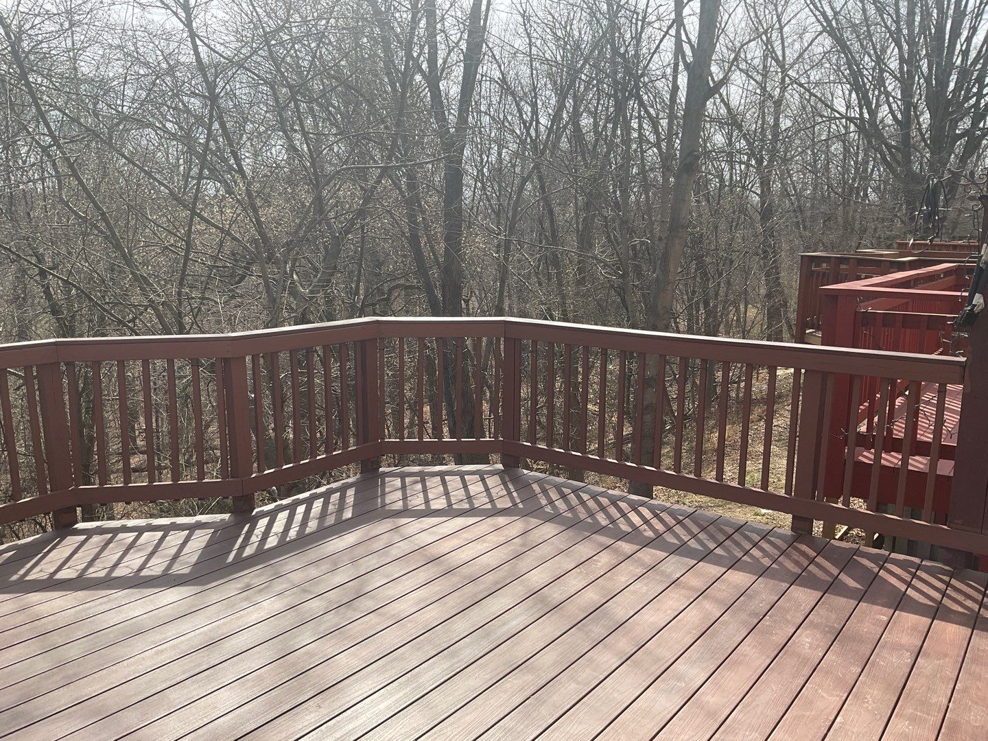 Deck Installation using New Composite Deck Board by Alpha Design Services