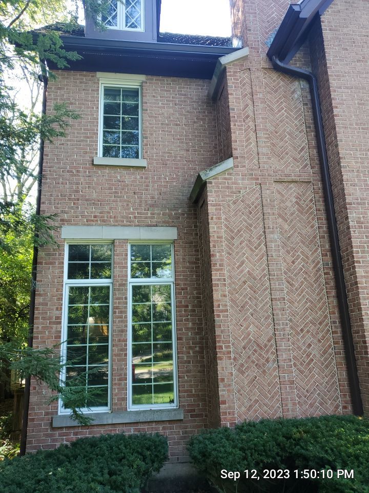 natural stone using Algaecide, soft wash soap by Northern Power Washing LLC.