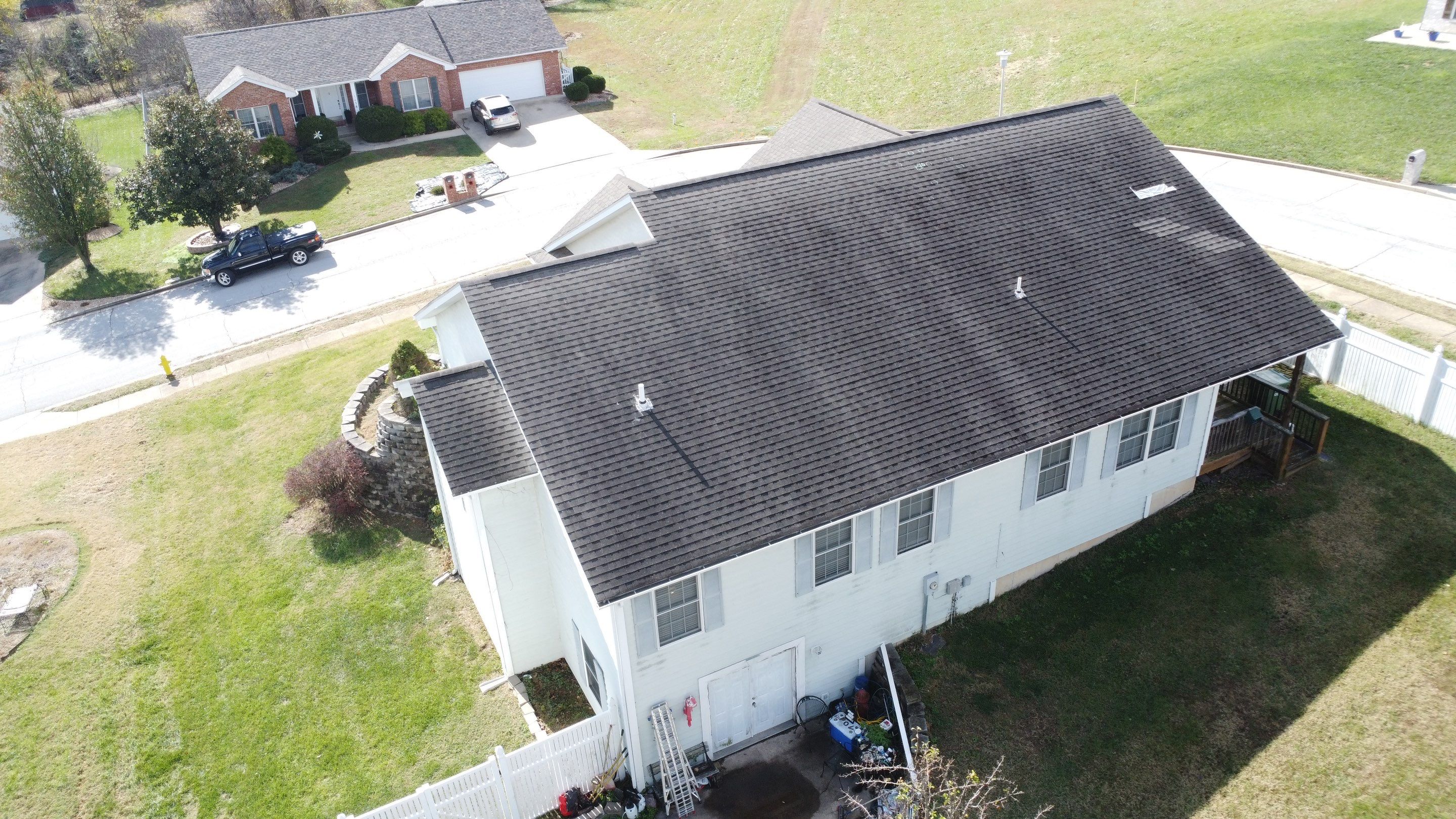 Residential Roof + Gutters & Downspouts Install  by Titan Commercial & Residential Roofing 