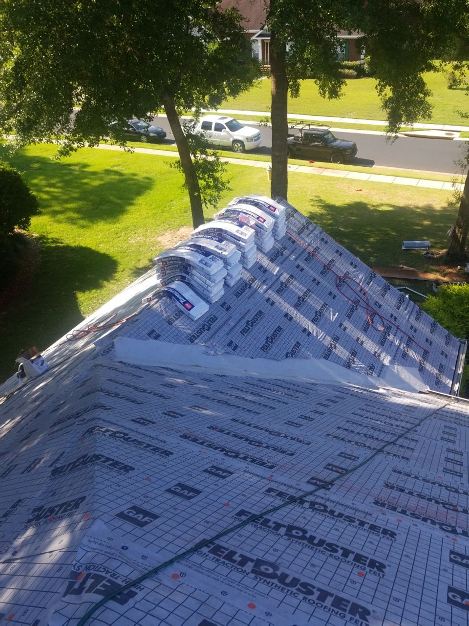 Residential Roofing Installation using Roof Replacement by American Roofing & Construction LLC
