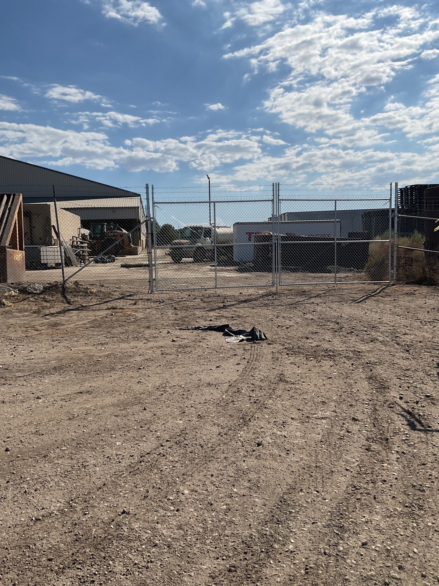 Commercial Chain-Link Double Drive Gate Repair by Fence Guys Inc.