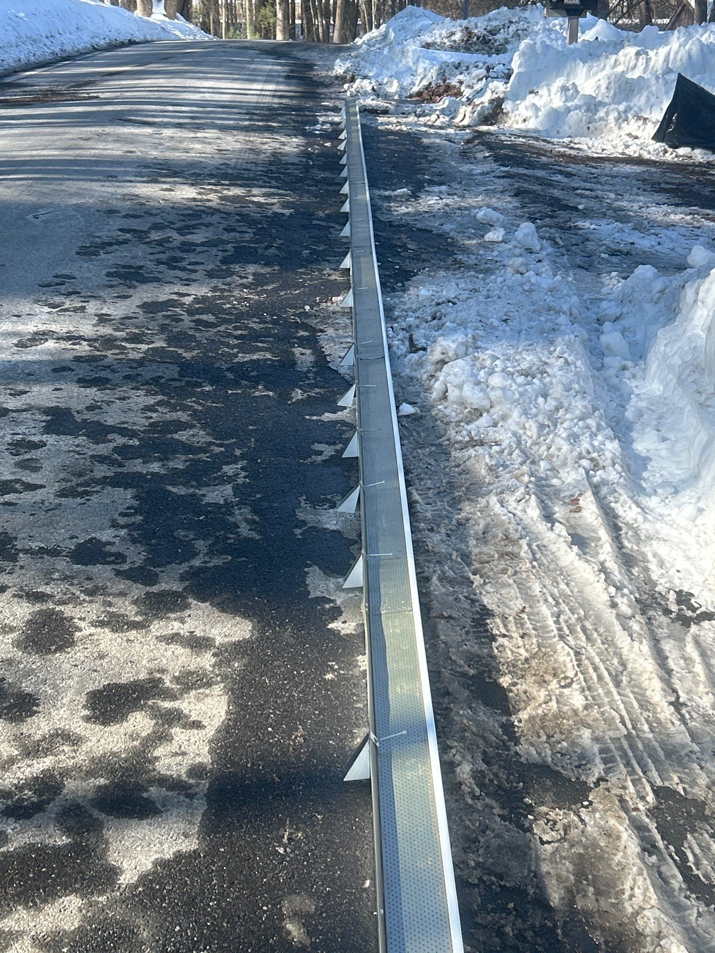 Gutter Installation Project in Stow by Mighty Dog Roofing of Greater Middlesex County