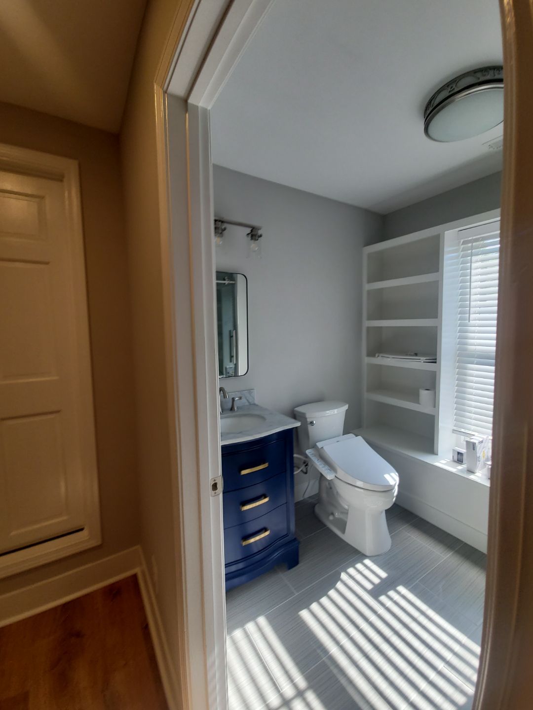 From Rafters to Retreat: An Attic Transformed with a Luxe Bath Escape by Elite Remodeling and Design LLC