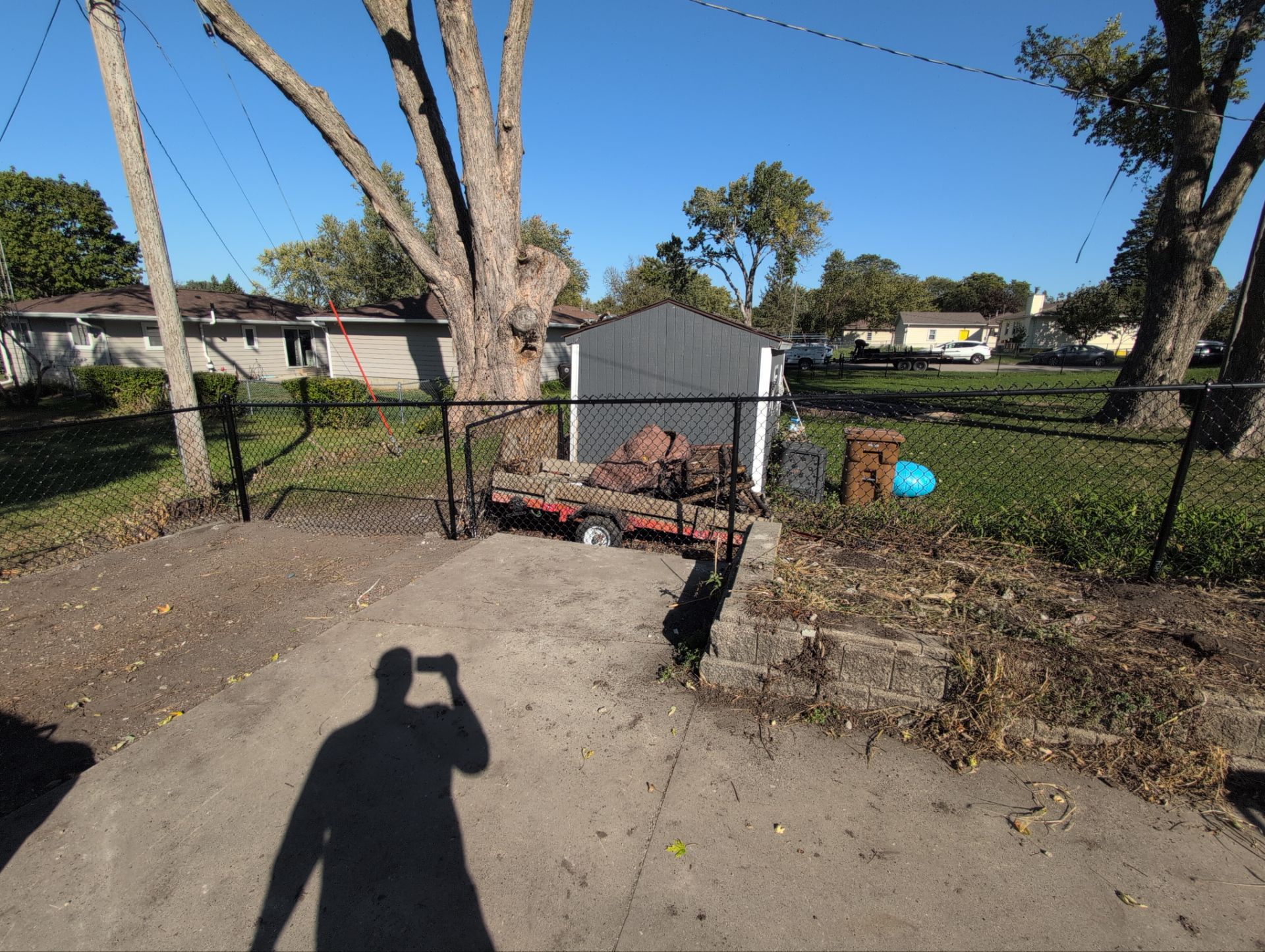 Black Chain Link Fence Installation for Waterloo Residential Property by Perfect Picket Fence and Stain