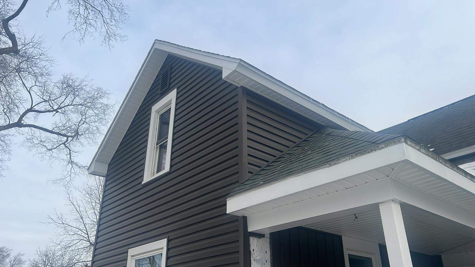 Residential fascia replacement using Exterior Portfolio 4.5 DL - Peppercorn by Nitro Roofing and Construction