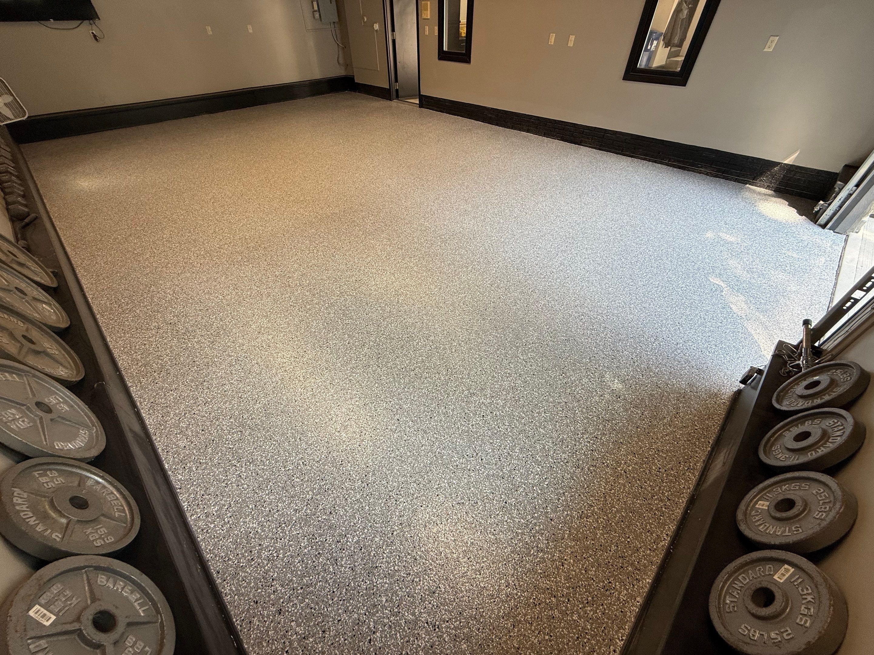 Garage Floor and Textured Pool Deck Coating in Sioux Falls by Select Painting, Coatings & Garage Cabinets