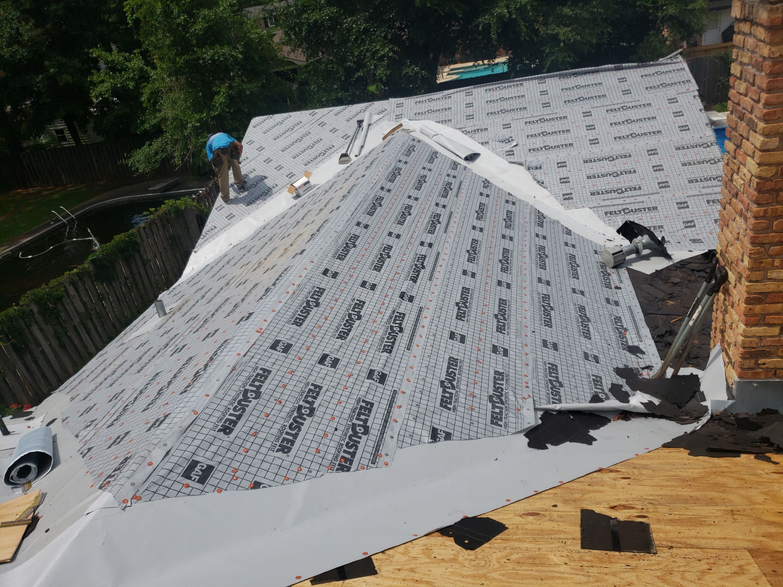 Residential Roofing Installation using Roof Replacement by American Roofing & Construction LLC