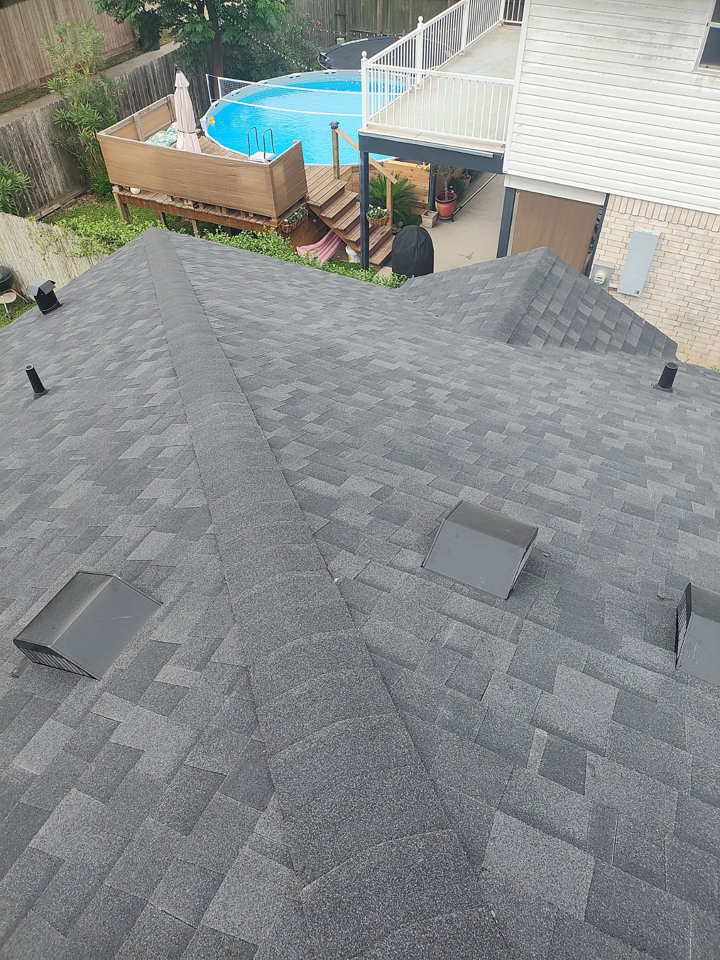Nothing looks nicer than a little black roof by Bayfront Roofing and Construction