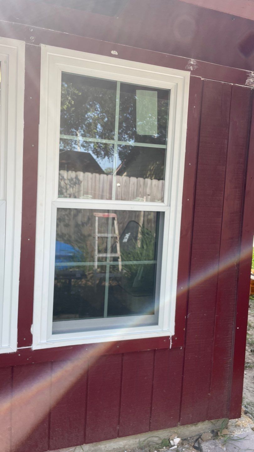 Black and white and red all over by Bayfront Roofing and Construction
