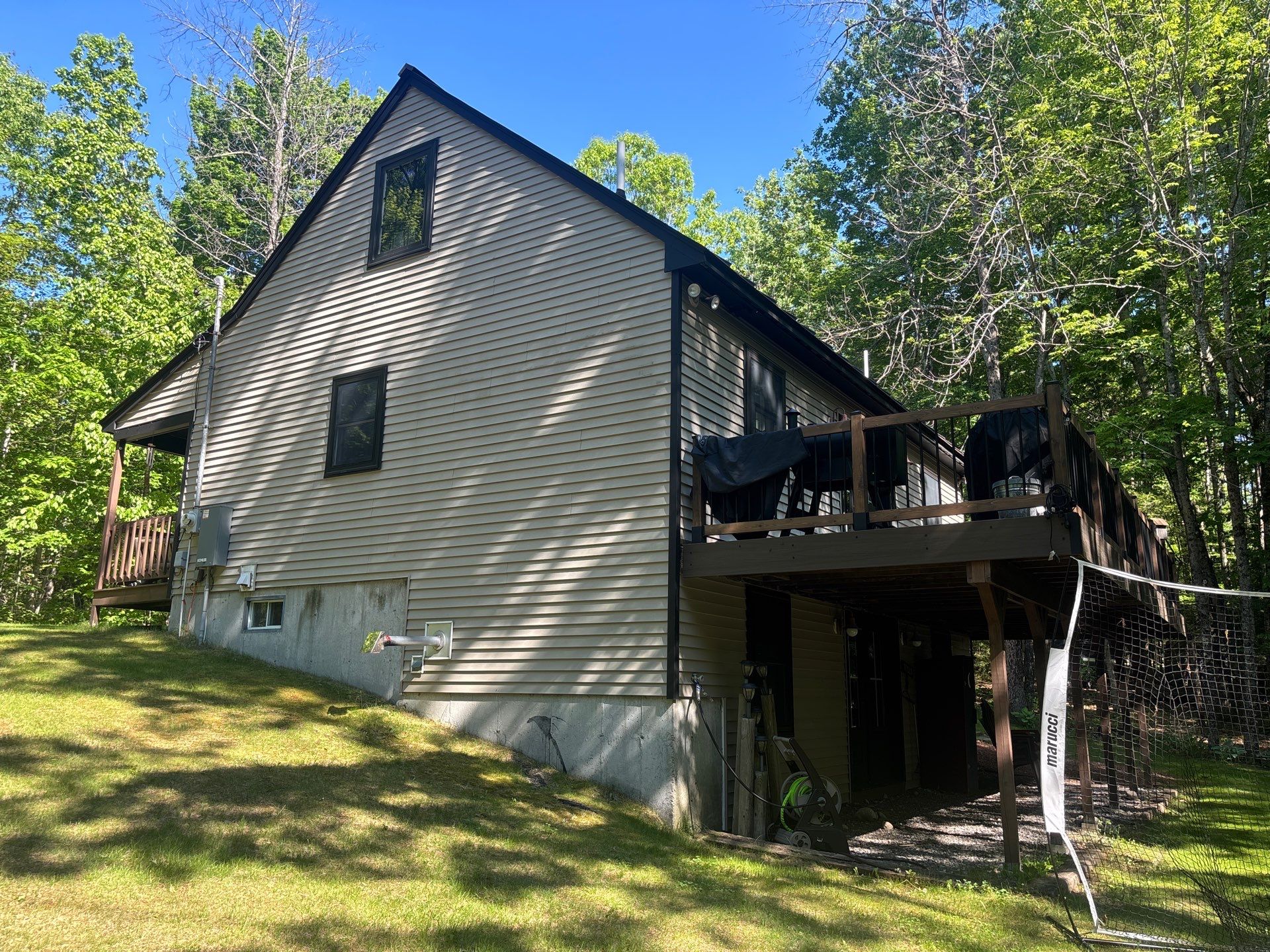 Sage Green Board and Batten Siding and Deck Upgrade in Standish by Tall pine roofing