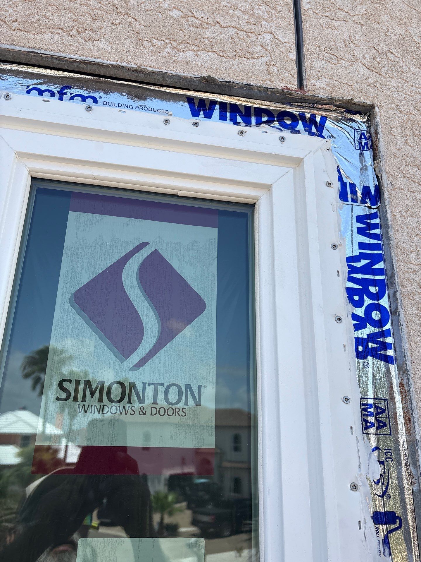 Installing Windows on a Submarine  by Bayfront Roofing and Construction