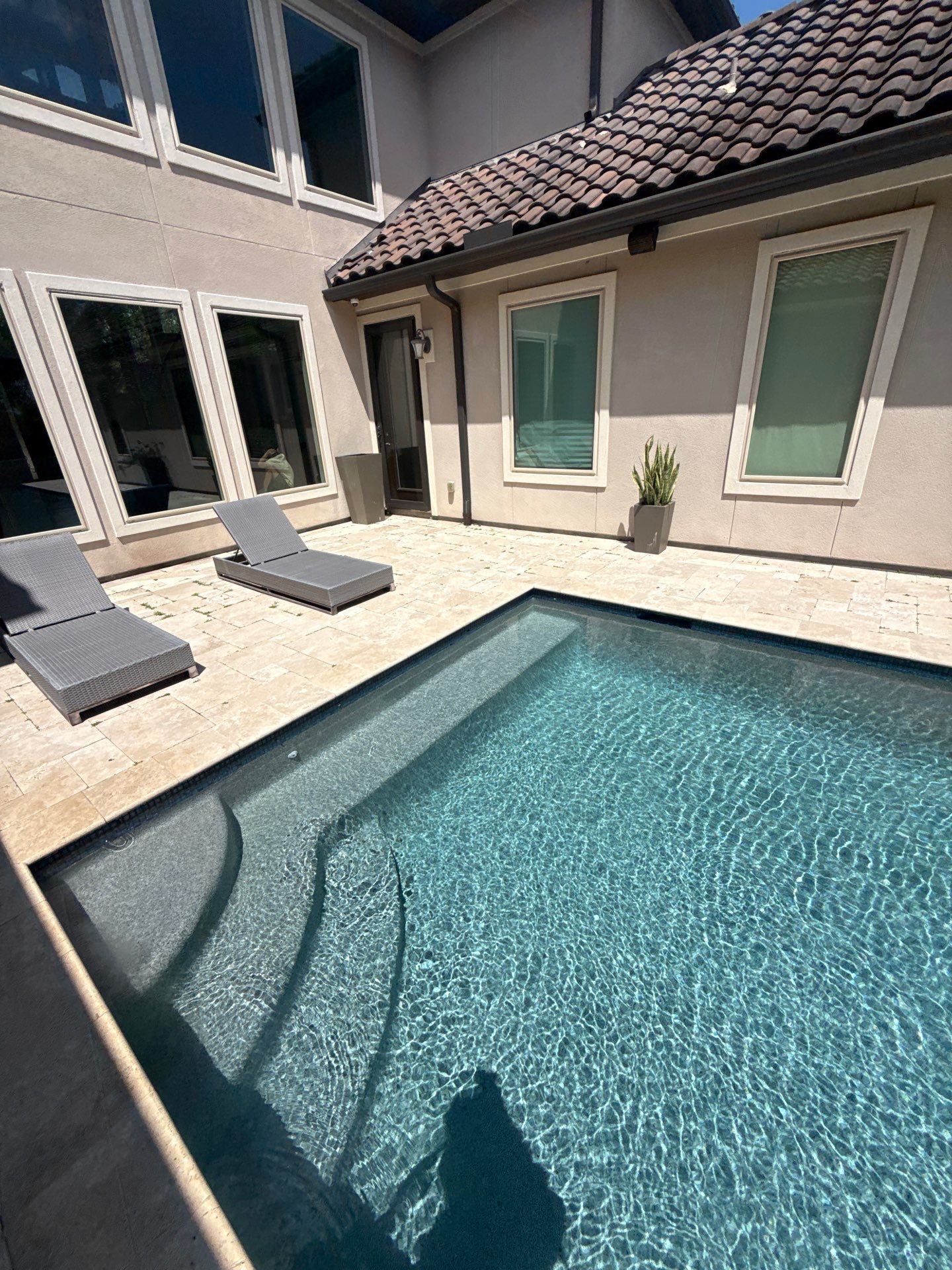 Friendswood House Wash and Travertine Pool Deck Cleaning by Zeal Power Washing