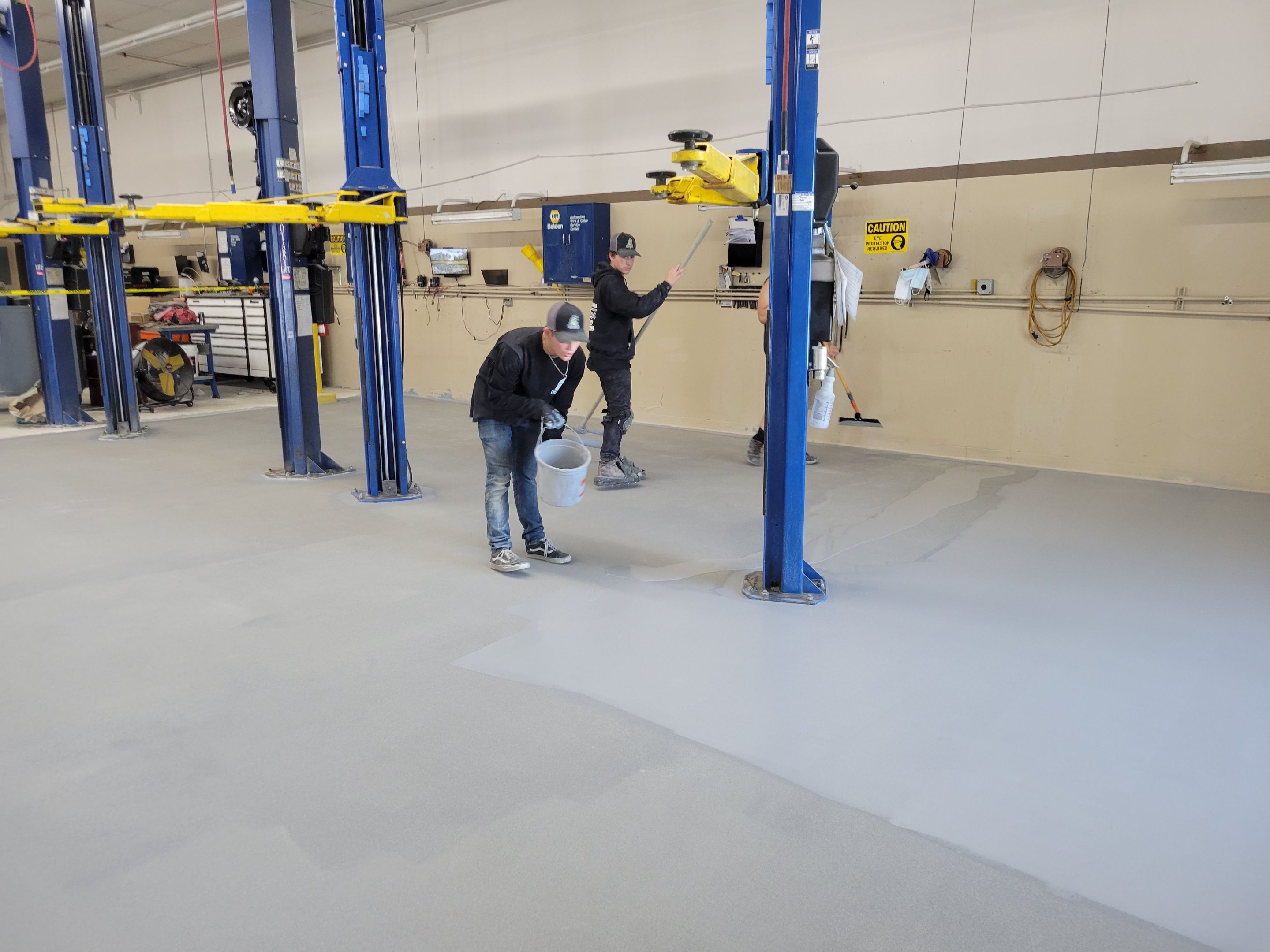 Commercial Floor Transformation using Penntek Shop Floor System by Croc Coatings, LLC