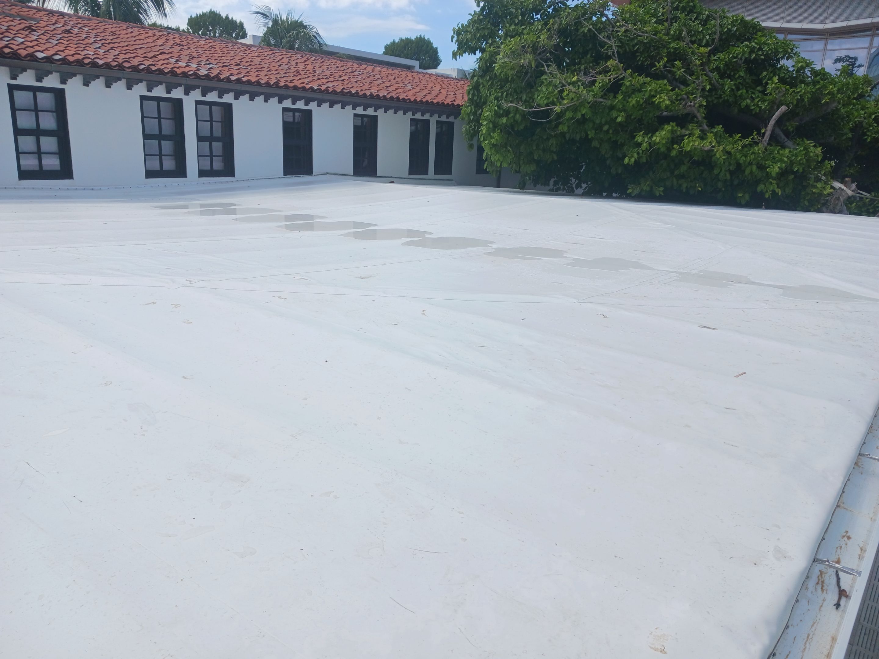 Commercial Roof Membrane Installation and Clay Tile Repair in Surfside by AJF ROOFING INC