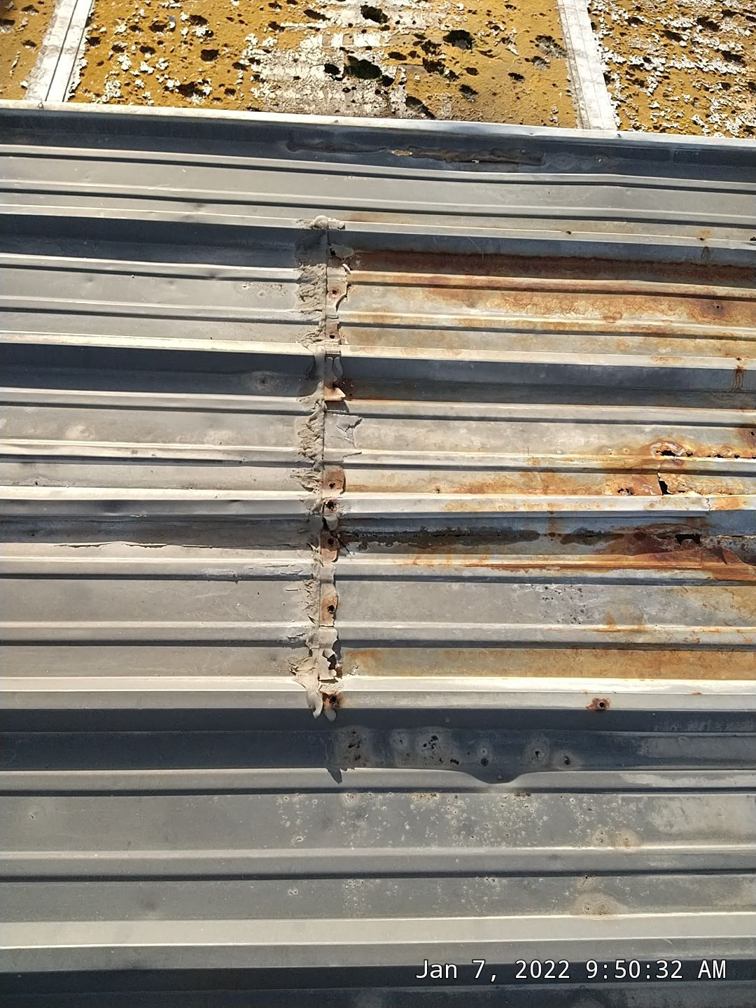 Commercial Roofing Installation using Aluminum Roofing panels by Hostetler Roofing