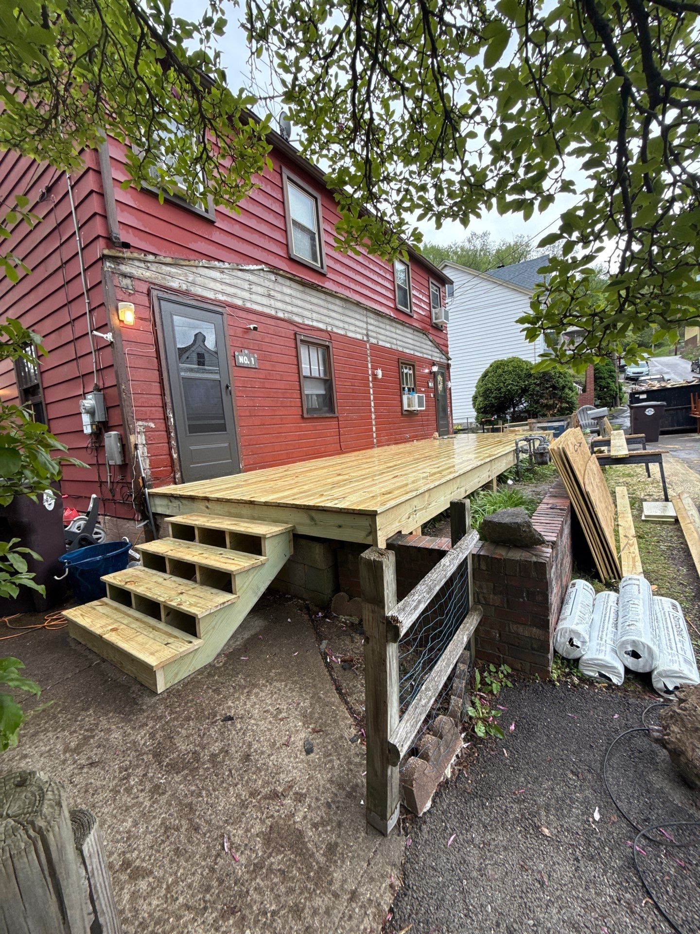 Roof sunspace deck  by Cousins Roofing Siding & Decks