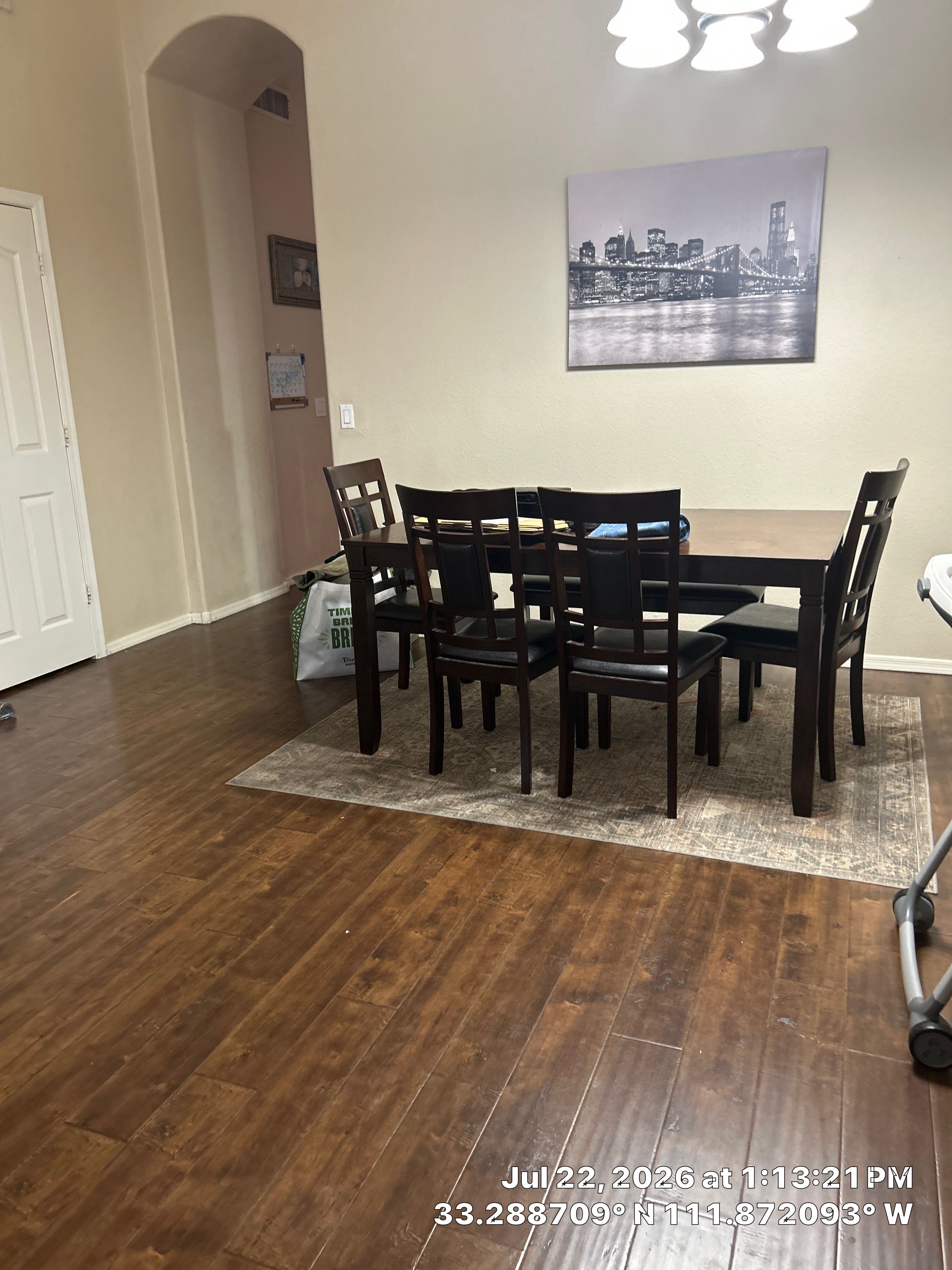 Interior Remodel Featuring Dark Wood Flooring in Chandler by CompanyCam Sales Demo