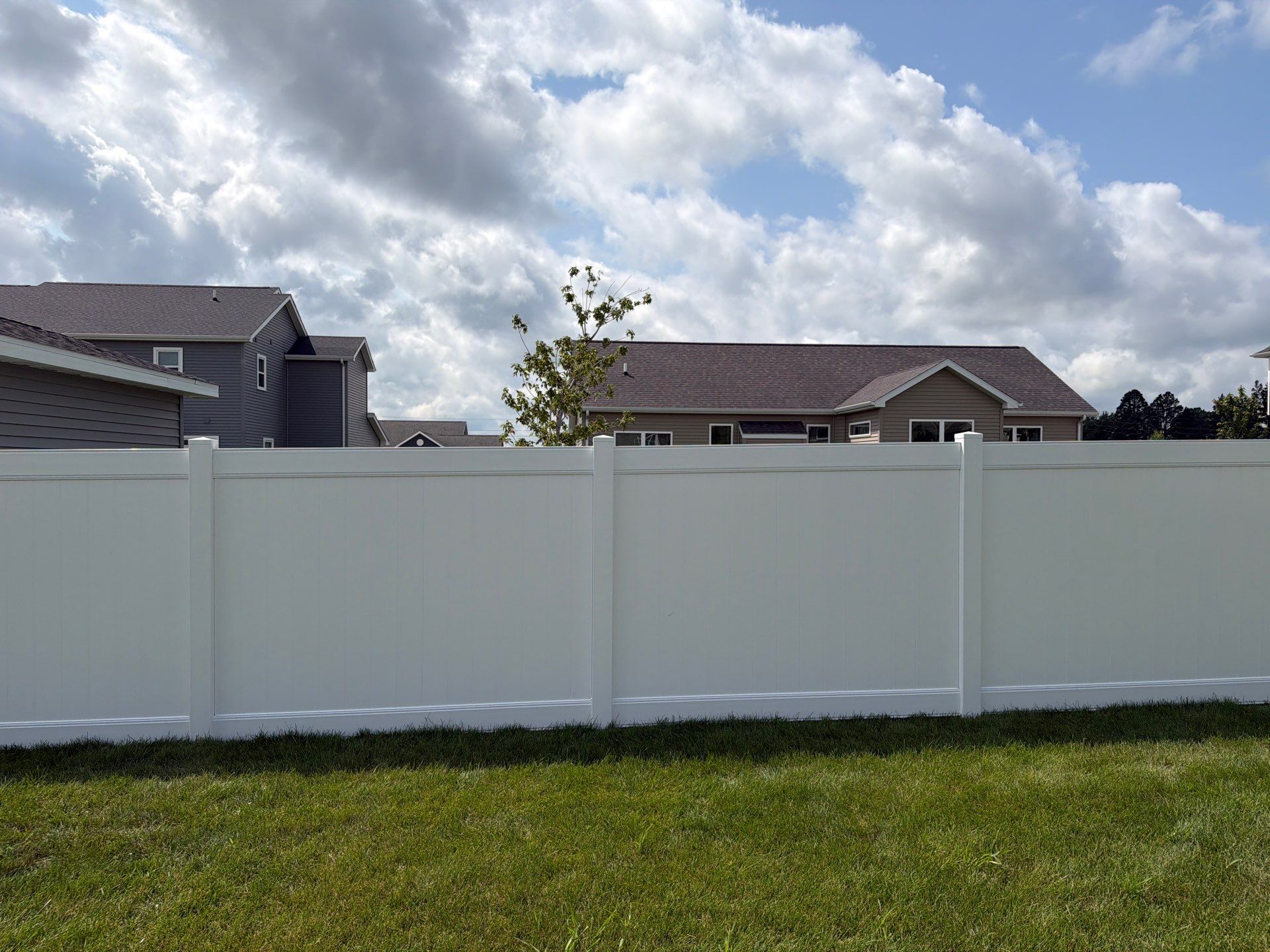 New Vinyl Privacy Fencing and Gates for Waterloo Residential Backyard by Perfect Picket Fence and Stain
