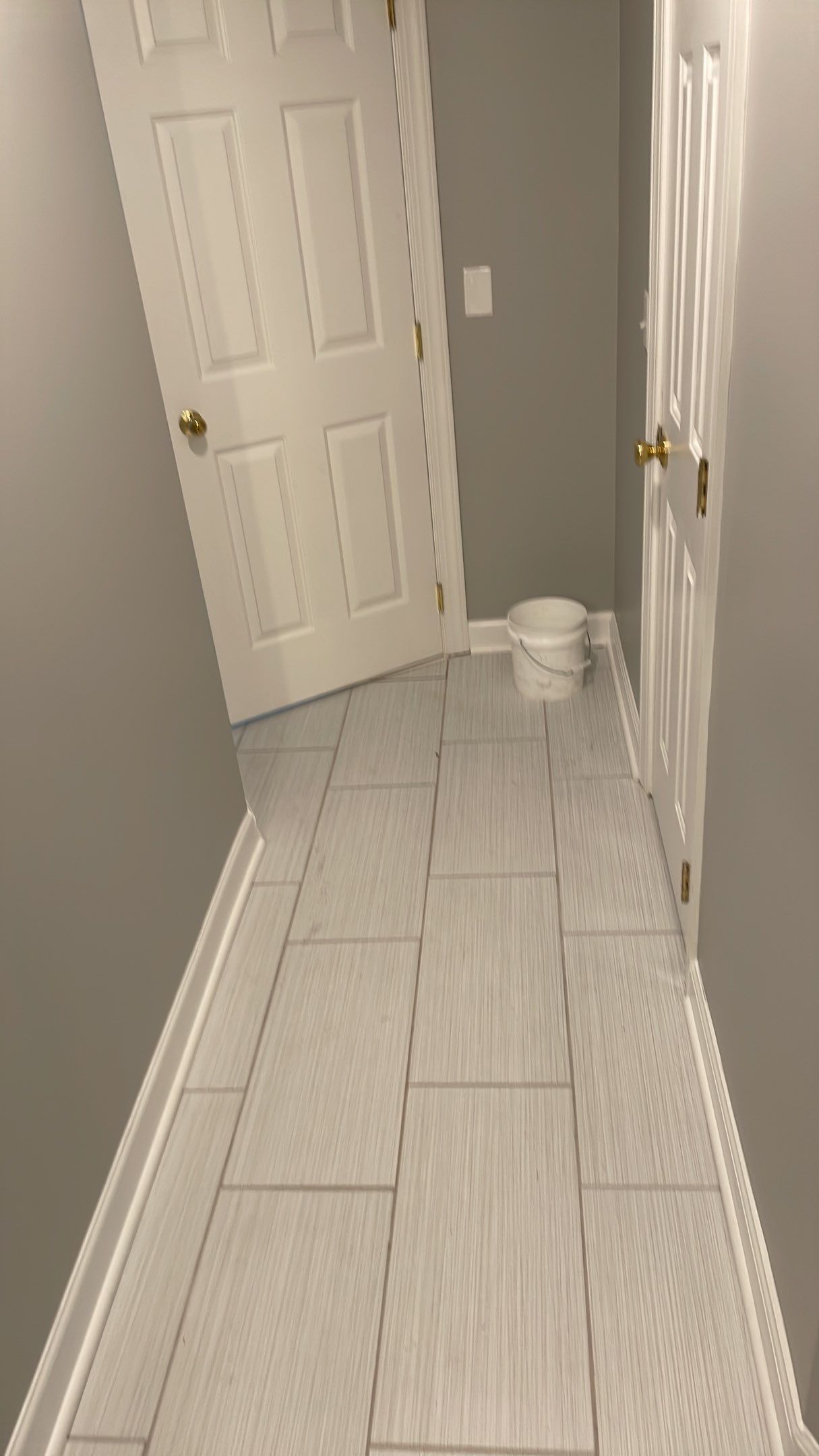 Bathroom Remodel using Schluter by Footprints Floors of Coastal Carolina