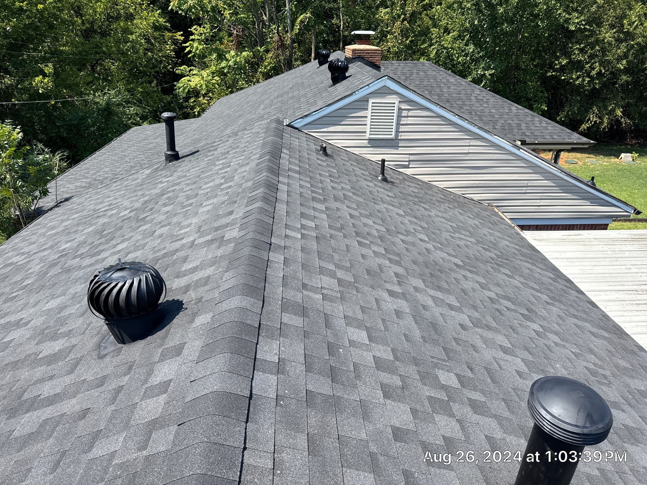 Reroof using IKO Granite Black by Castillo Roofing