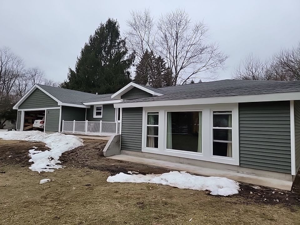 Exterior Remodel by Avalon Roofing and Exteriors