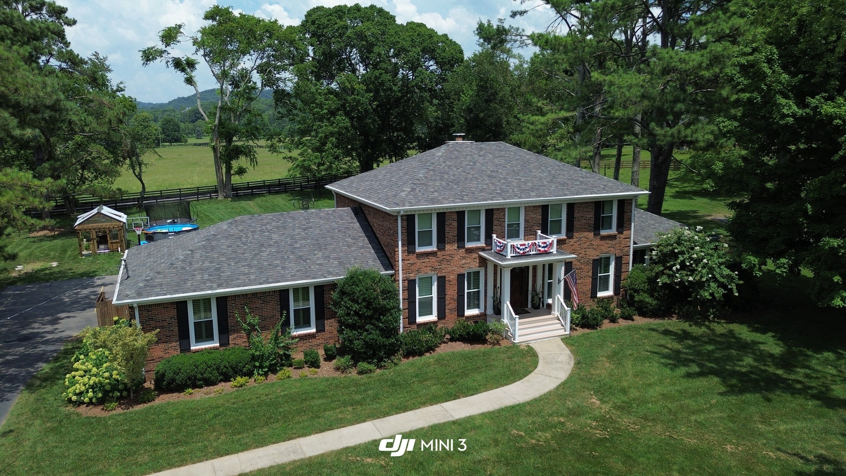Full Roof Replacement and Skylight Installation for Franklin Colonial Home by Shinglesmiths Roofing