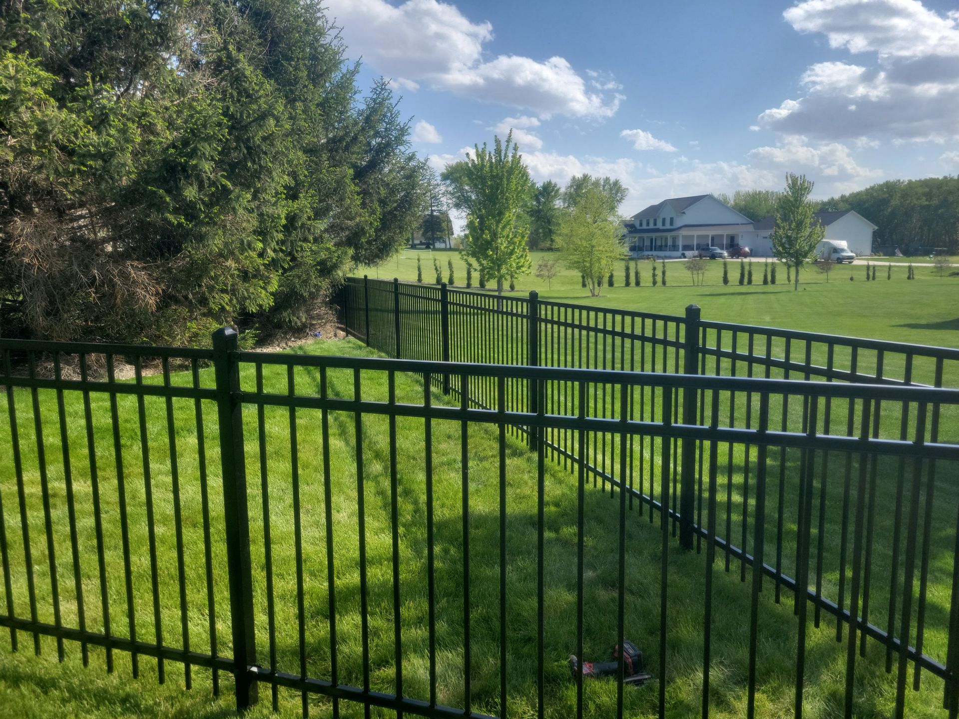 Black Ornamental Metal Picket Fence Installation in Waterloo by Perfect Picket Fence and Stain