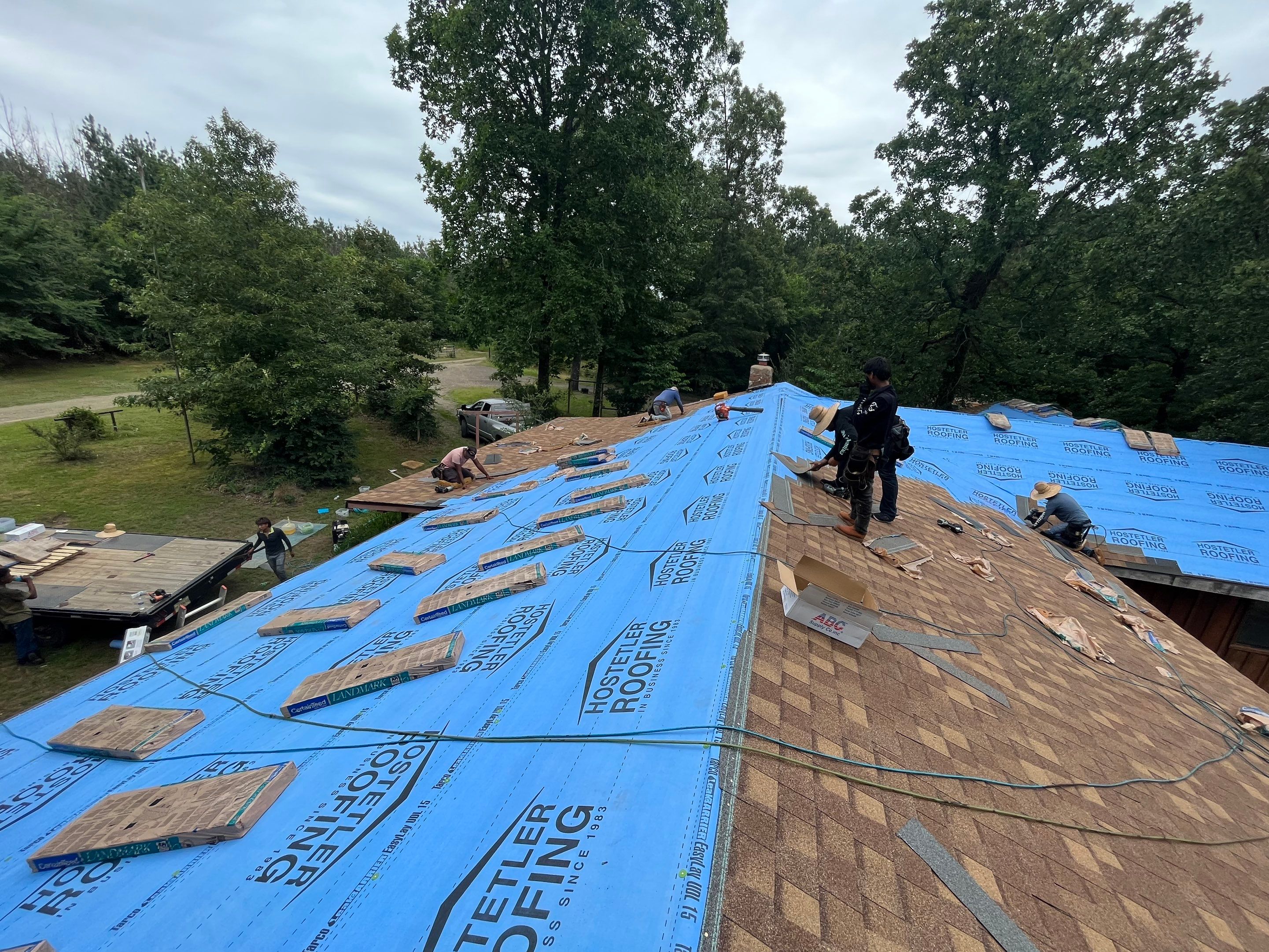 Storm Restoration Reroof: 25 Year 3-Tab Shingle by Hostetler Roofing
