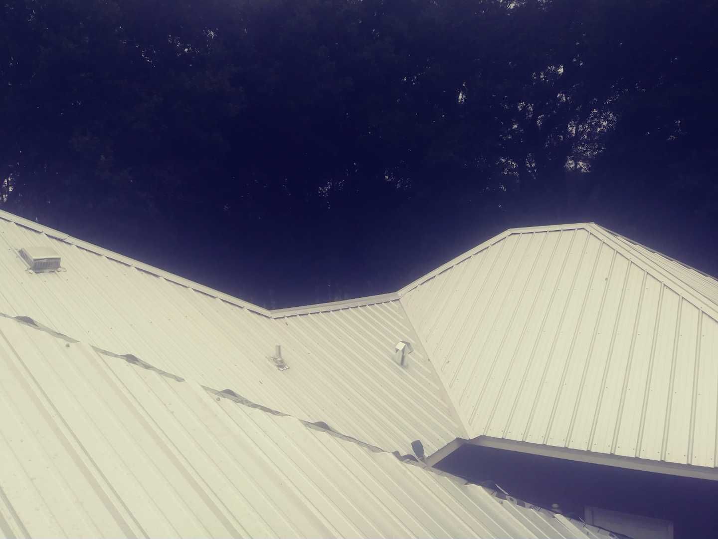 Residential Roofing Installation using Metal roofing by American Roofing & Construction LLC