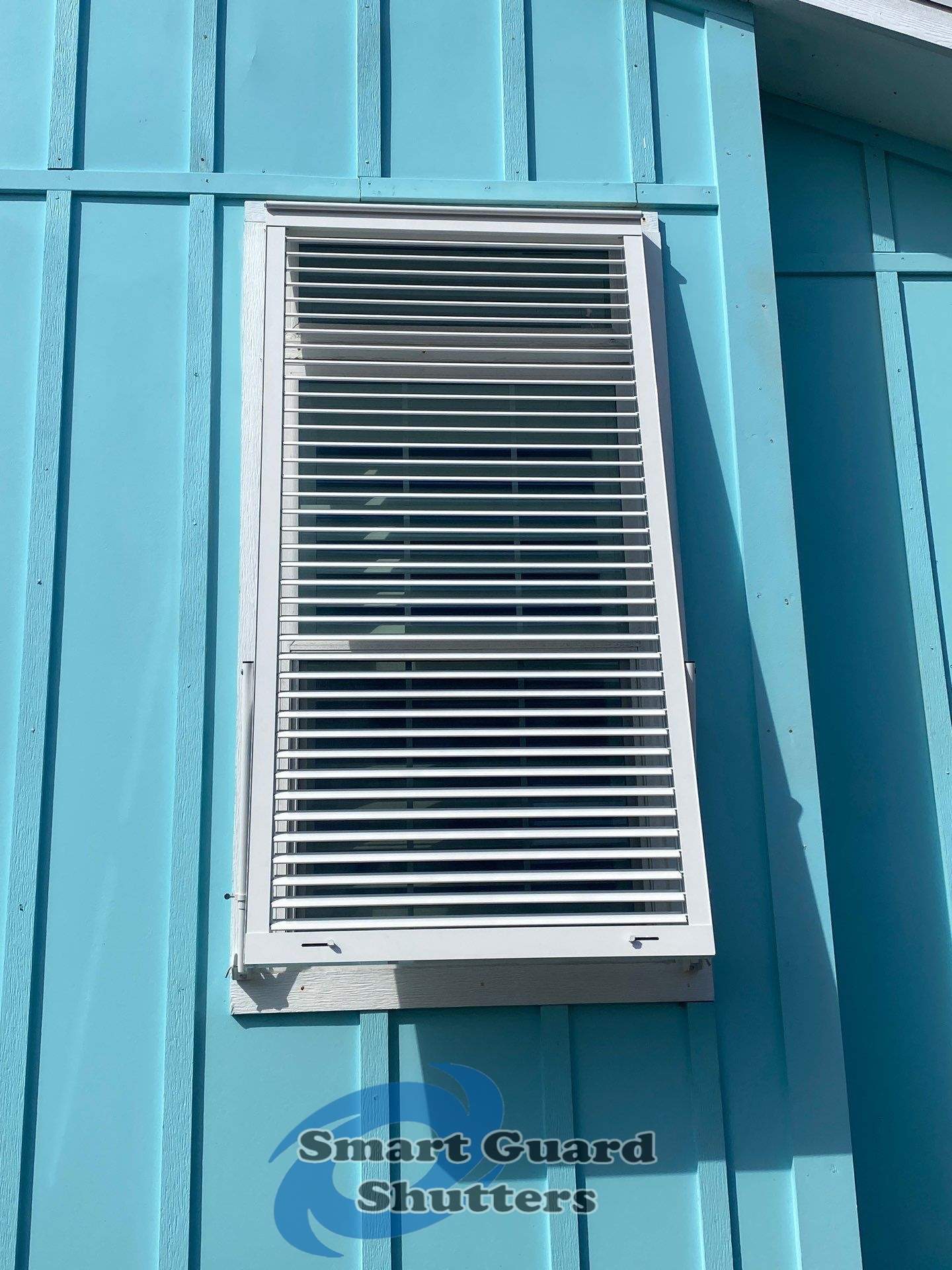 Impact Bahamas in Signal White by Smart Guard Shutters