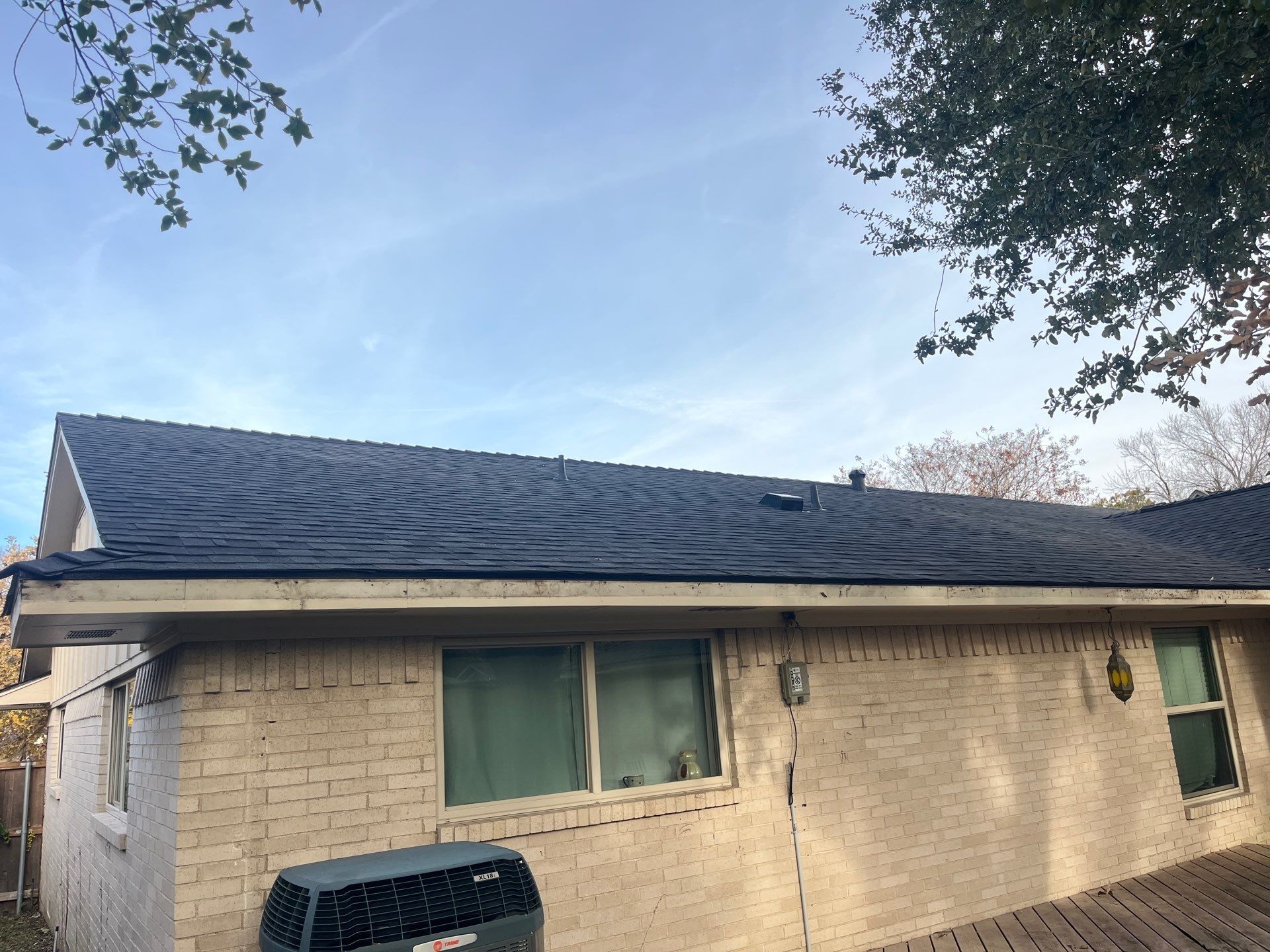 IKO Brownstone- White Brick  by Tejas Roofworks + Restoration