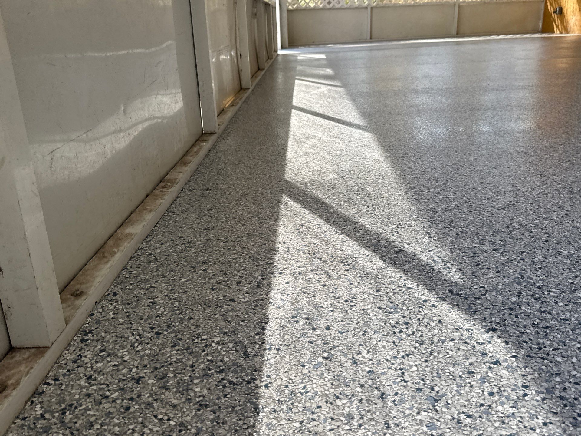 Patio in Tidal Wave by Cross Creek Concrete Coatings