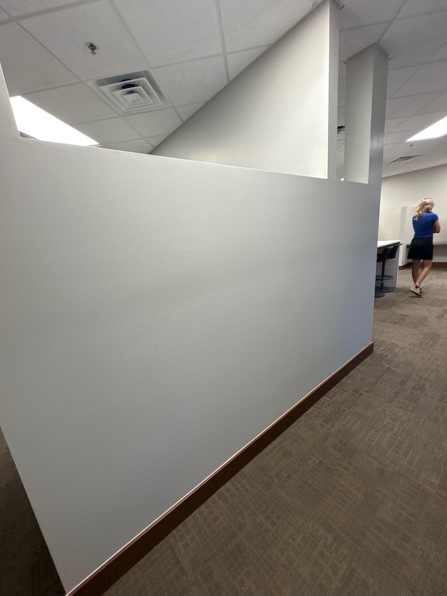 Commercial Office Interior Remodel and Modern Suite Refresh in Sioux Falls by Select Painting, Coatings & Garage Cabinets