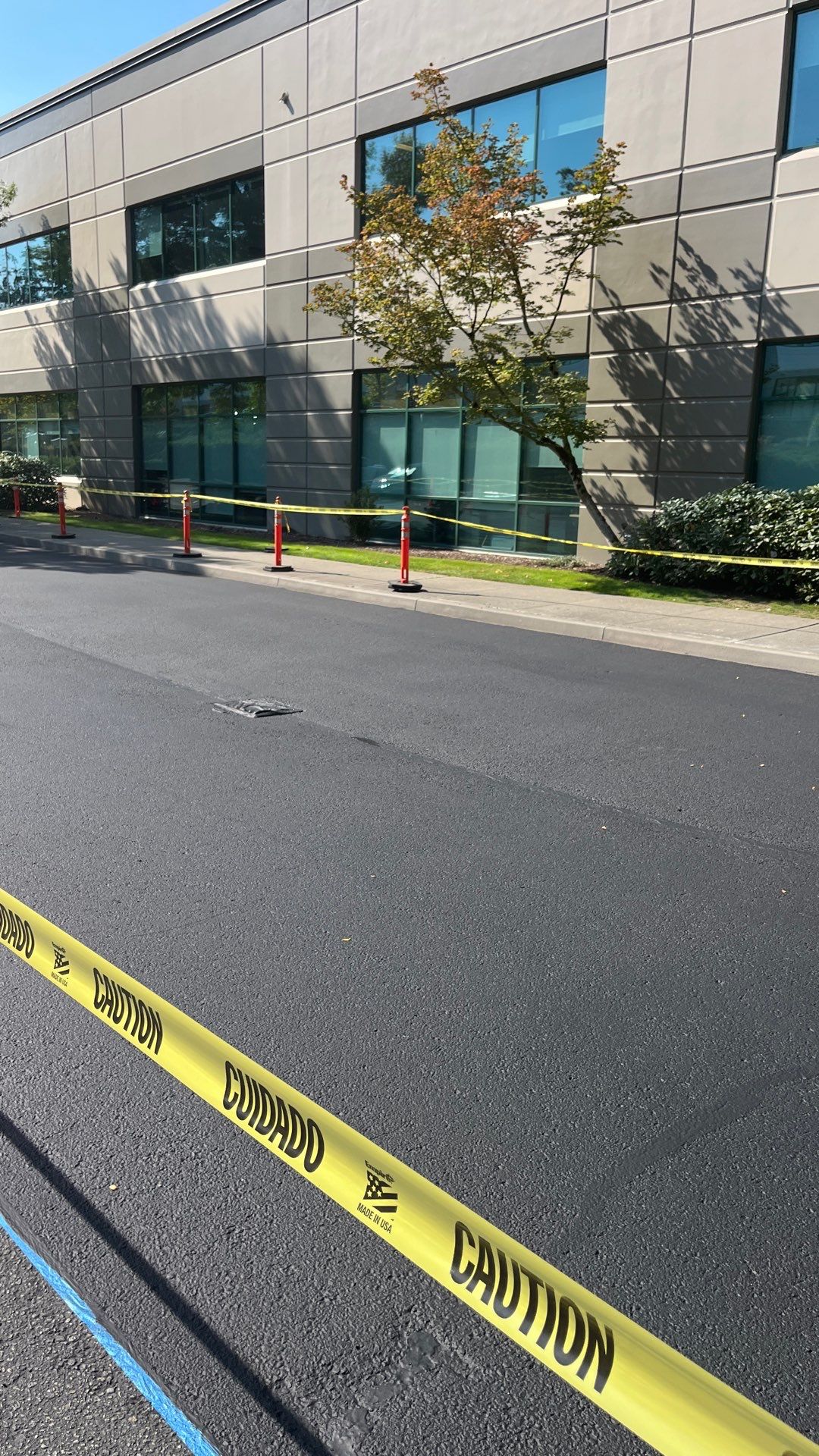 Kidder Matthews | Parking Lot Sealcoating & Striping with Concrete Curb & Patch Repairs  by Jireh Asphalt & Concrete Inc 