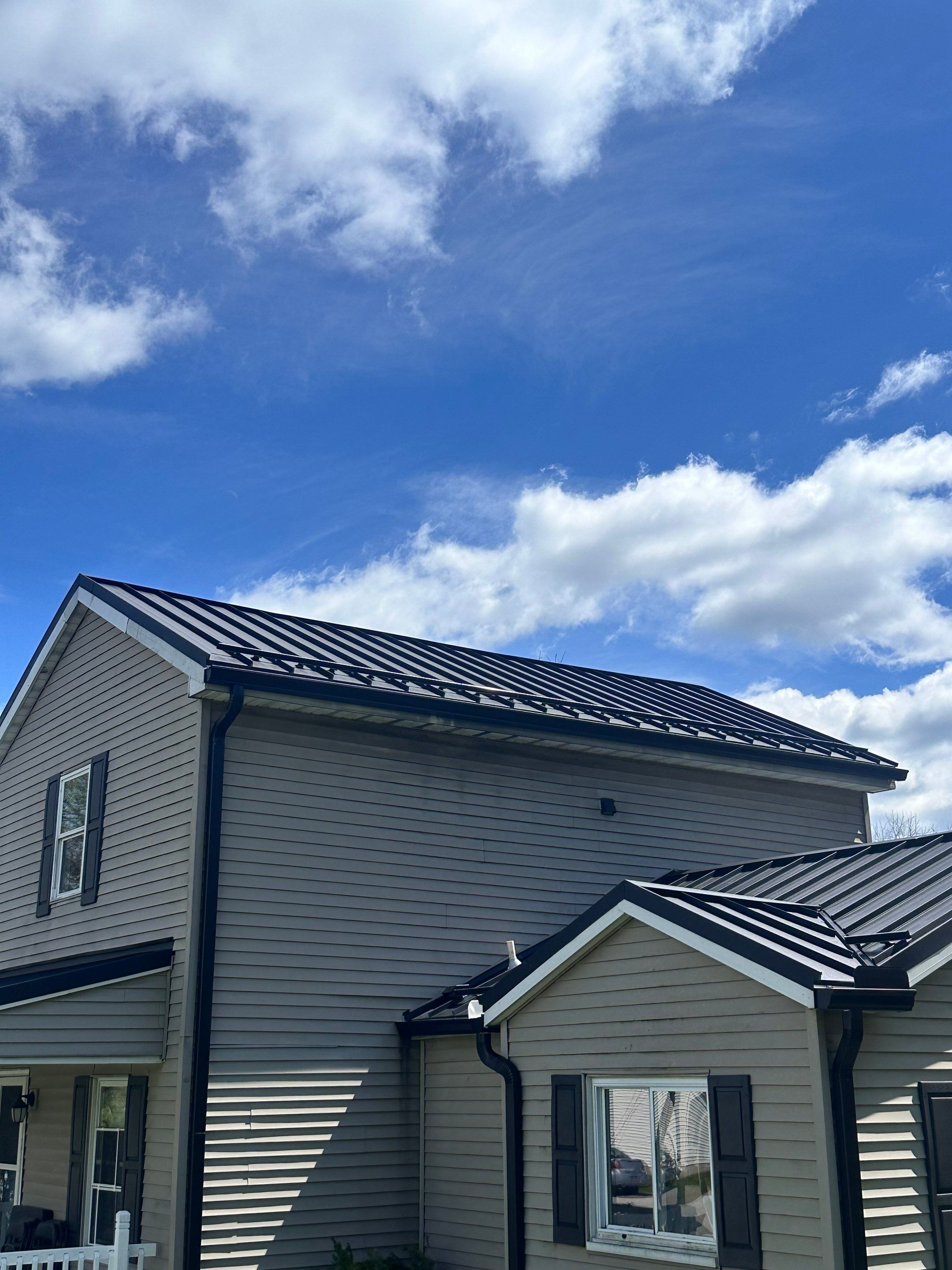 Residential Roofing Installation using Texture Standing Seam by Teflon Roofing