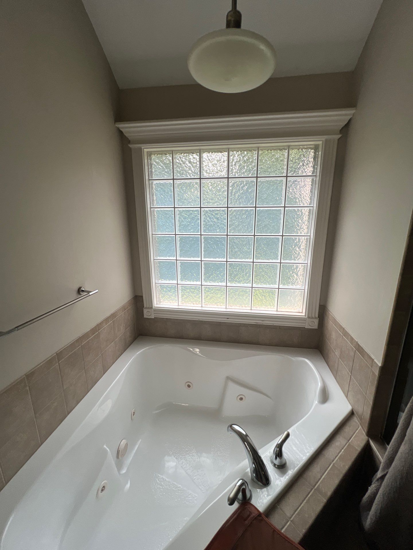 Full bathroom remodel with Artus lighted mirrors, Waltz bathtub and Mercury doors by The Shower Company