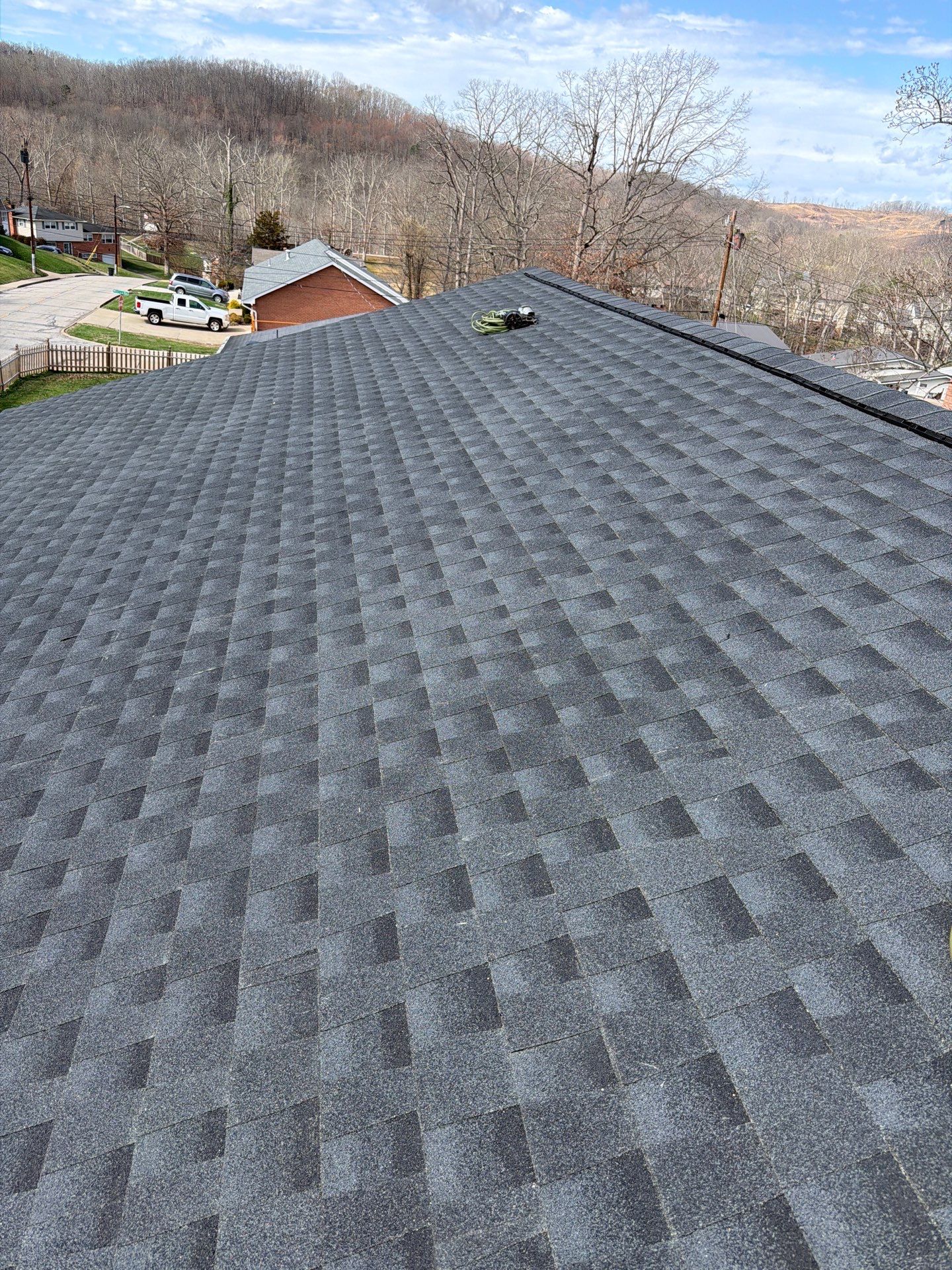 Residential Roofing Installation using GAF Timberline HDZ Charcoal by Rainstoppers Roofing