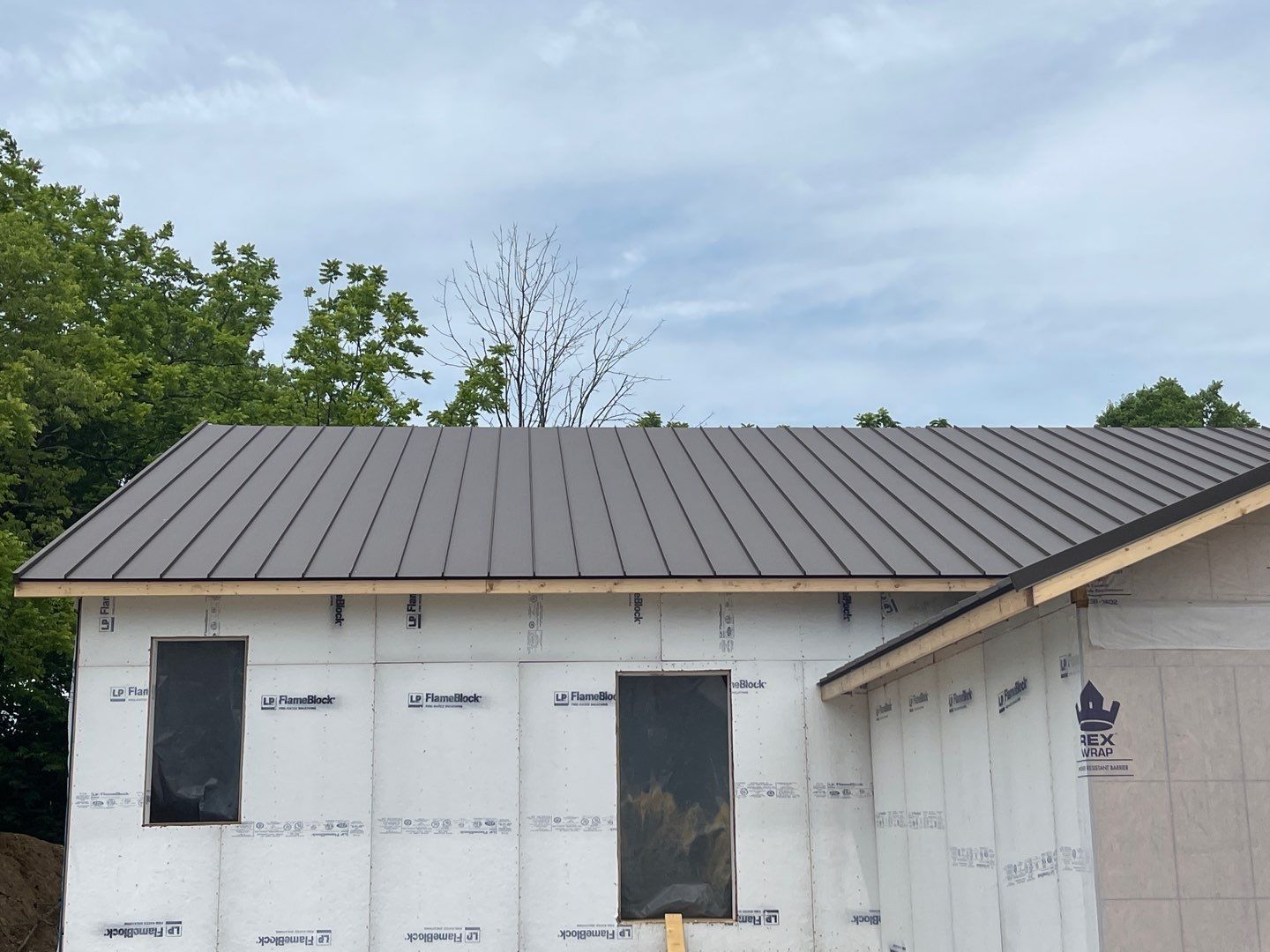 Commercial Roofing Installation using Standing Seam Metal - Burnished Slate Frost by RoofX 
