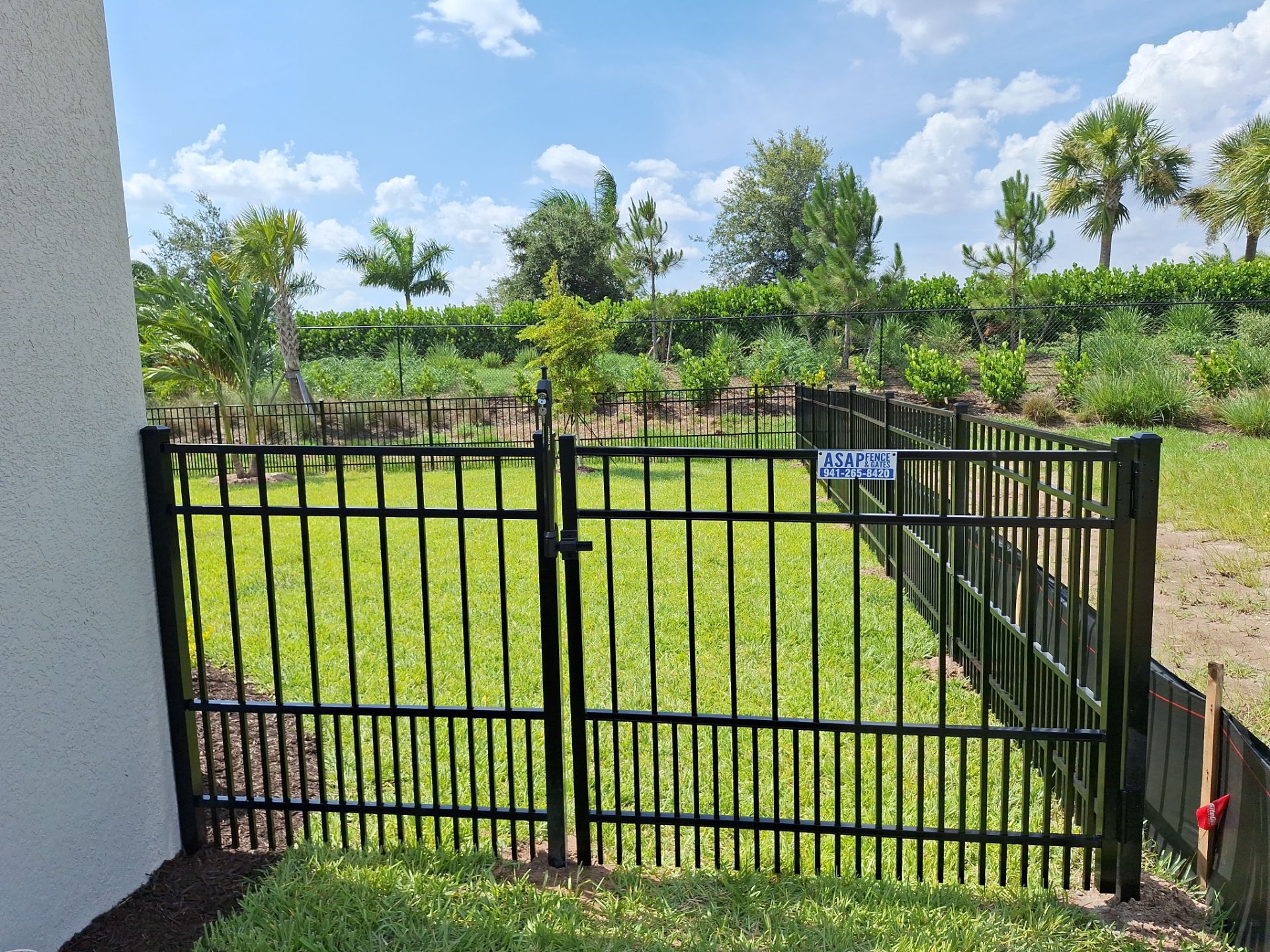 Aluminum Fence Installation using Black 3 Rail Aluminum Fence by Asap fence and gates, LLC