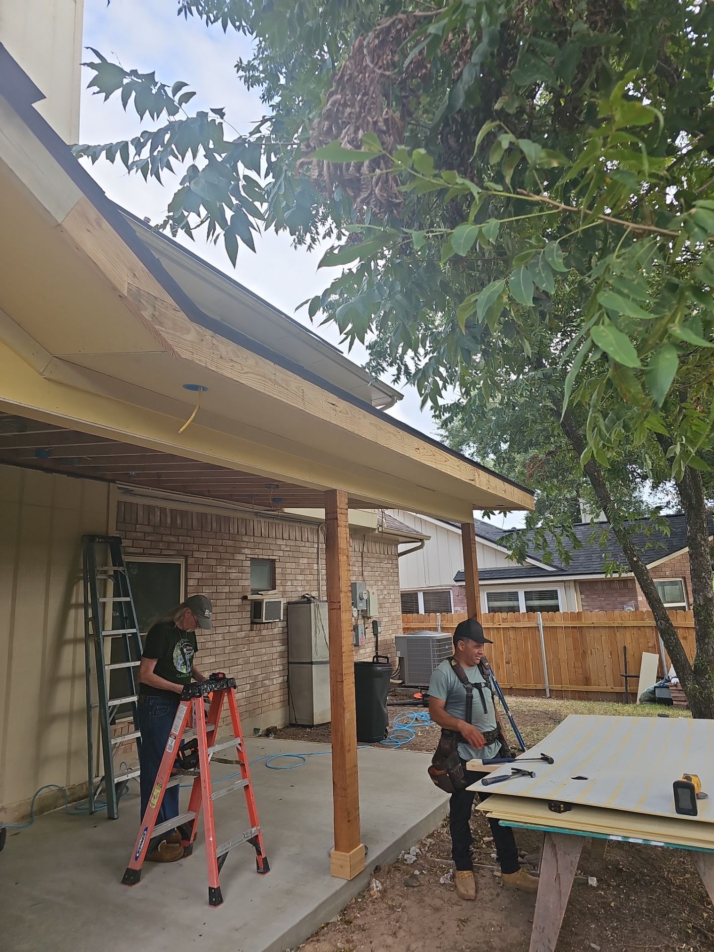 Beautiful New Covered Patio by DeZign Roofing & Exteriors