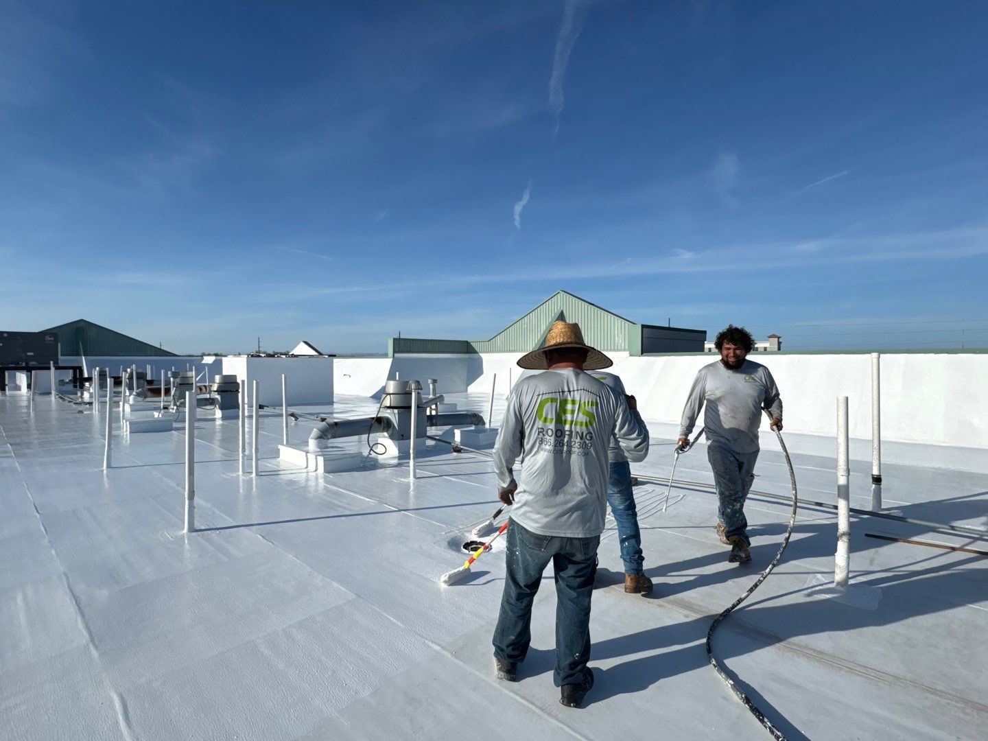 Commercial White Silicone Roof Coating for Hotel in Oldsmar by CES Roofing