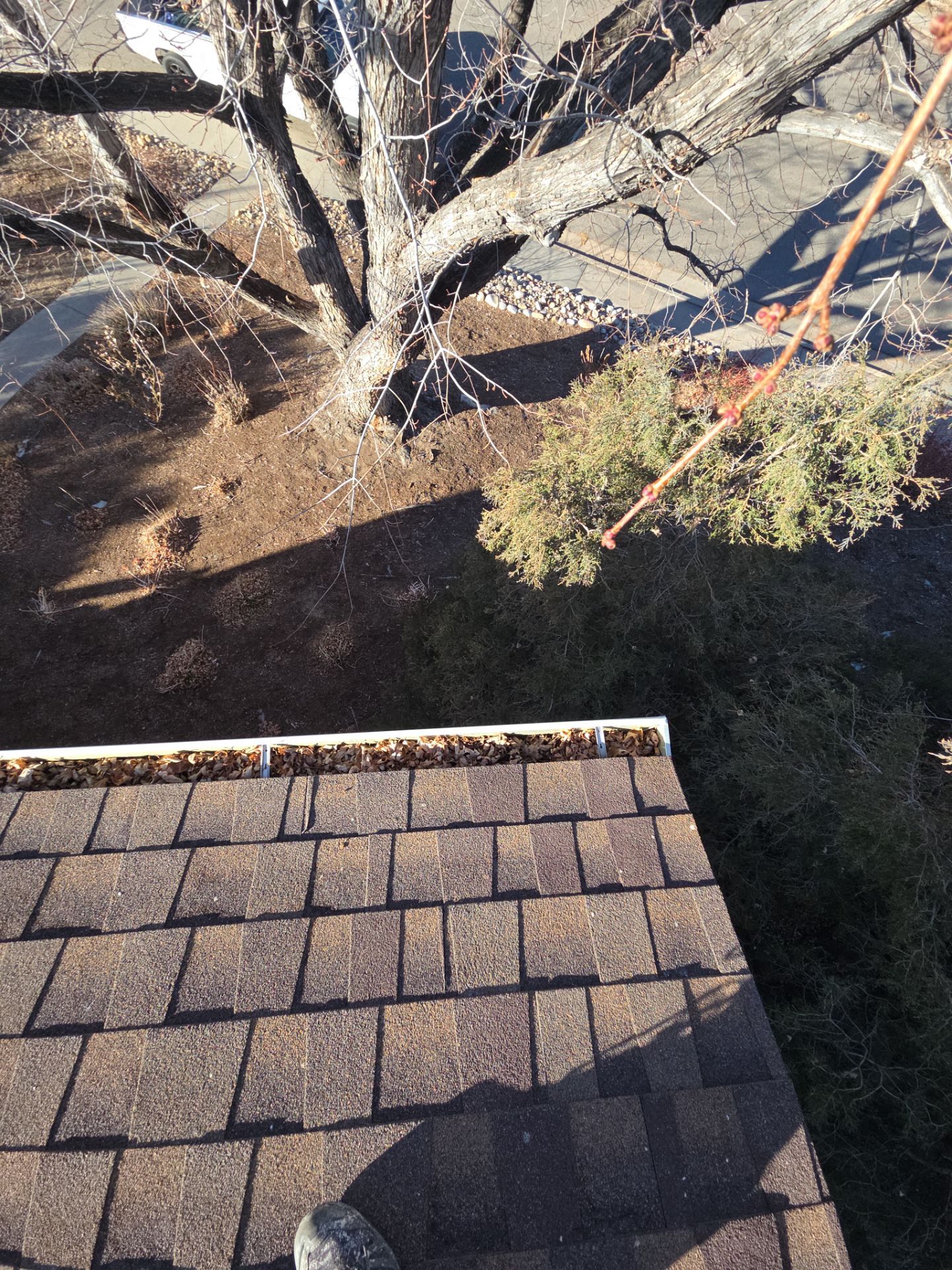 Clean Gutters and Downspouts by RTP Roofing Company