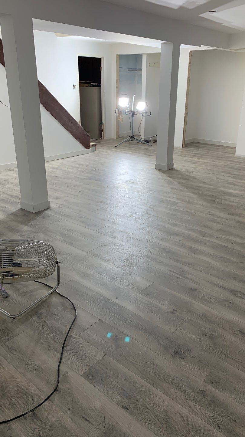 Basement rebuilt after flood by Eco-Nature Construction Inc.