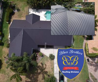 Residential Roofing Installation using 1" Nail strip metal roof