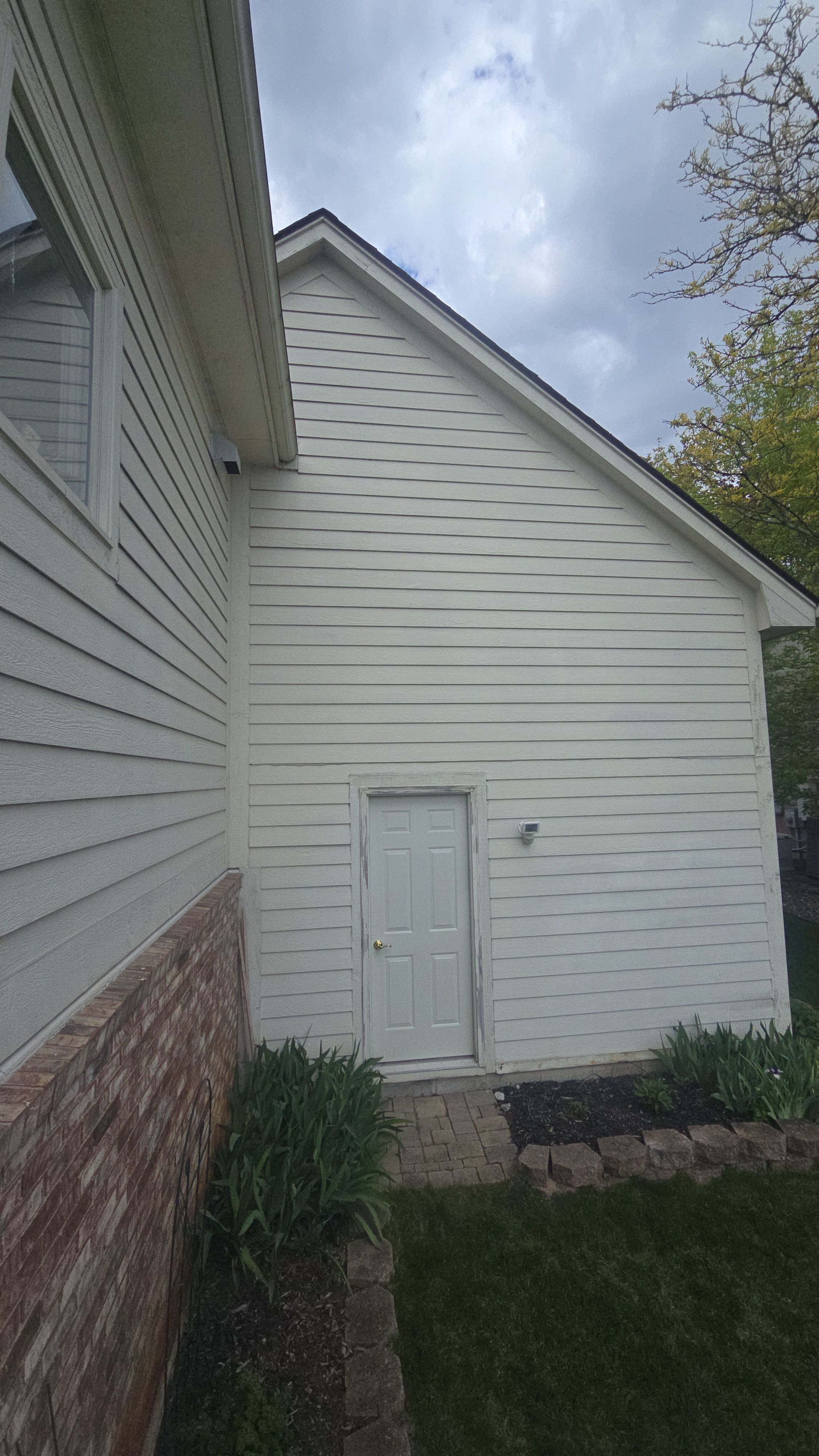 Exterior Wood Rot Repair and Trim Restoration in White Lake by Top Shelf Painter