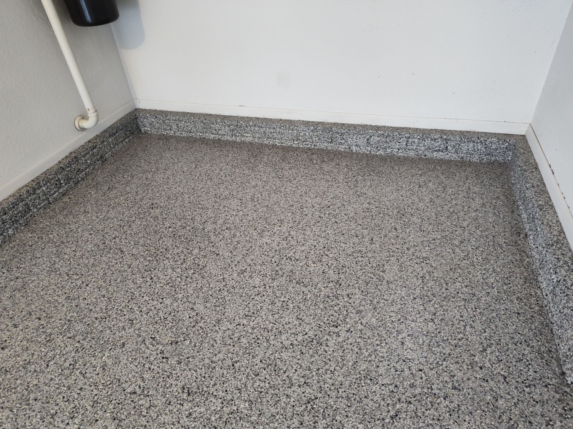 A Garage In One Day Keeps the Rock Salt Away! by Revival Concrete Coatings