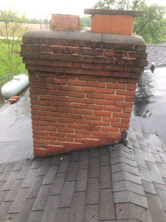 Residential Roofing Installation using 60 mil rubber roof  by Nitro Roofing and Construction