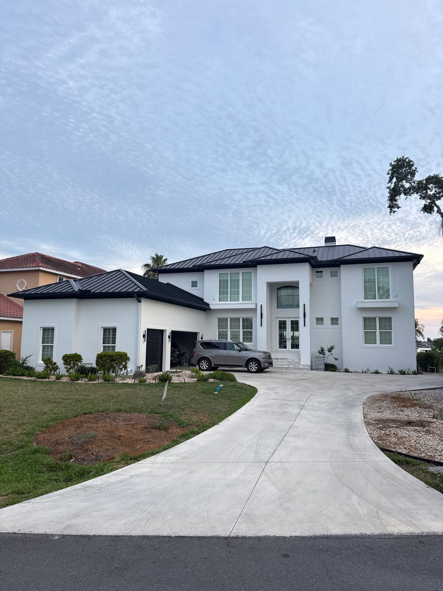 Soffit and Fascia Installation and black seamless gutters in Sarasota FL by Gutter Professors