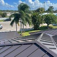 24ga 1.5" Mechanical Seam Dark Bronze by Total Roofing System The Metal Roof Experts